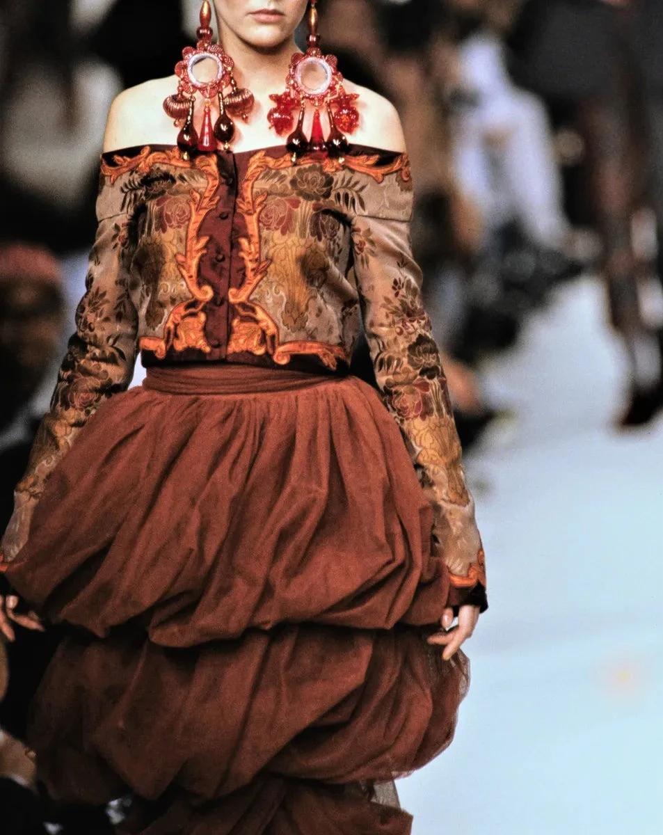 S/S 1990 Romeo Gigli textured burgundy layered skirt with tie at waist. Draped linen blend 3-tiered midi skirt with original tags. Button side closures. As seen on the runway. 