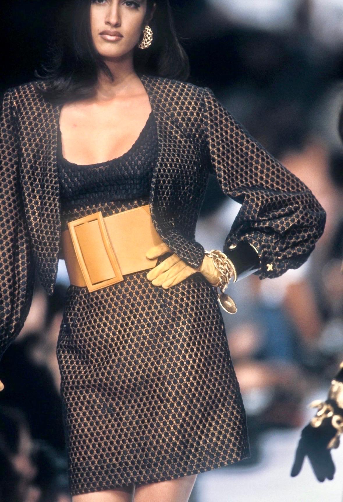 Presenting a sensual yellow and black knit Christian Dior Boutique dress, designed by Gianfranco Ferré. From the Spring/Summer 1991 collection, this beautiful sleeveless dress features a knit polka dot pattern atop a yellow mesh at the body and
