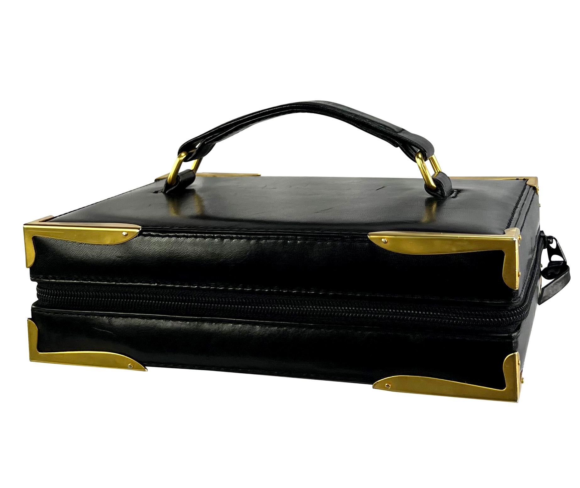 Women's S/S 1992 Donna Karan Runway Black Leather Book Style Clutch Travel Bag For Sale
