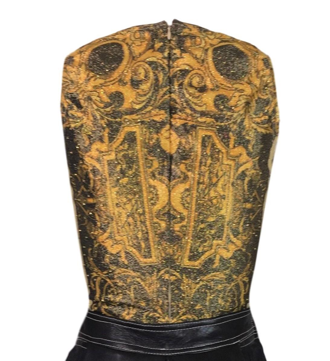DESIGNER: S/S 1992 Gianni Versace

CONDITION: Good- flawless!

FABRIC: Nylon blend

SIZE: 42- runs small with stretch

MEASUREMENTS; provided as a courtesy only- not a guarantee of fit: 

Chest: 30-38