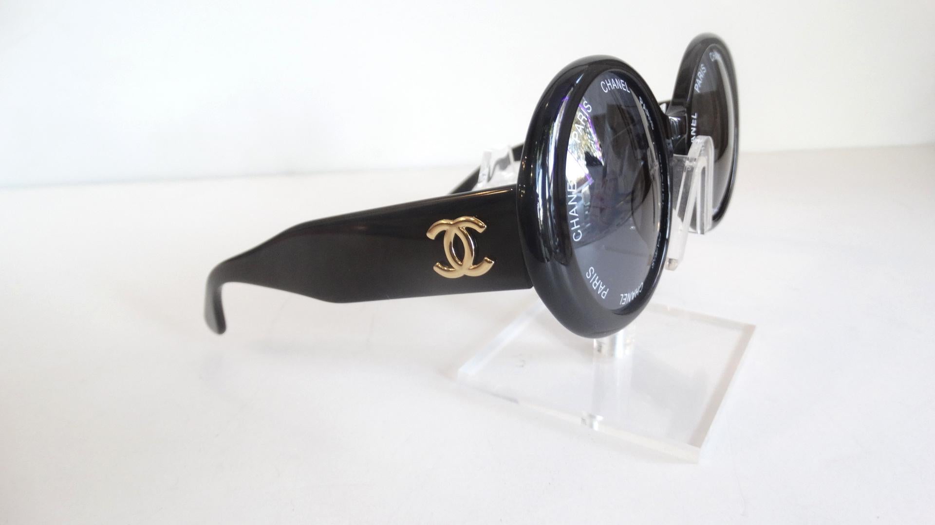 Your Everyday Sunglasses Are Here! From the Spring/Summer 93' collection, these black circle frame Chanel sunglasses feature 