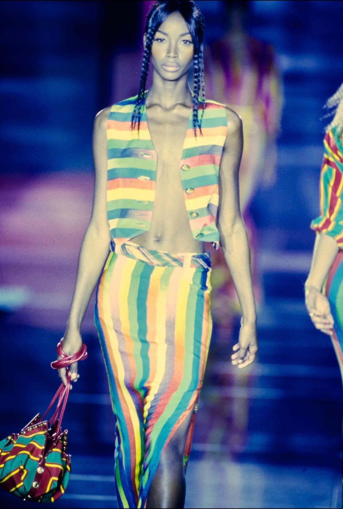 Presenting an iconic runway Gianni Versace Couture tote designed by Gianni Versace. From the Spring/Summer 1993 collection, the bag's bold stripe print was used on the runway in multiple looks, including number 59, modeled by Carla Bruni, and number