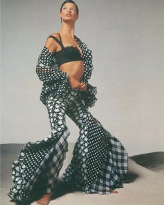 P/E 1993 Gianni Versace: tuta a campana con motivo floreale e a pois