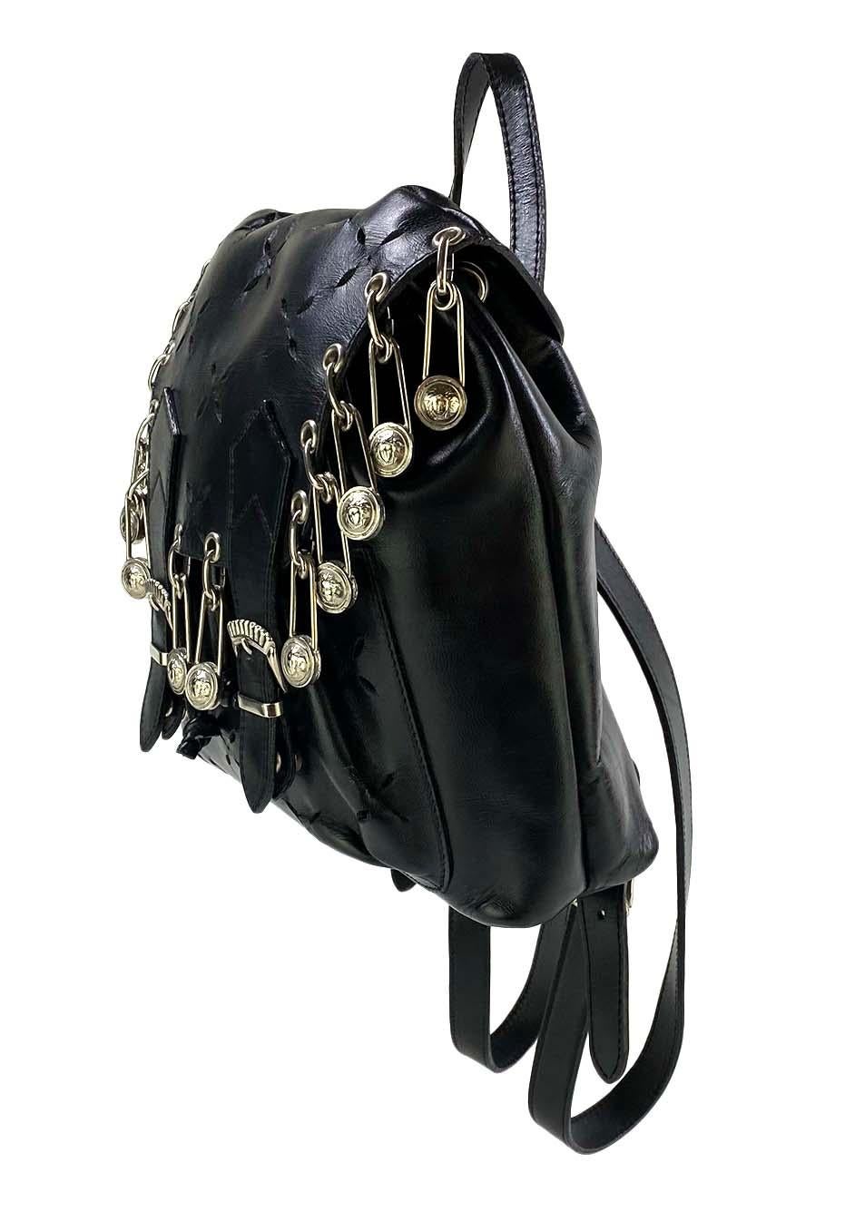 Presenting a rare punk-inspired mini backpack designed by Gianni Versace for his Spring/Summer 1994 collection. Multiple variations of this bag were worn on multiple looks in the season's runway presentation and in the ad campaign on Linda