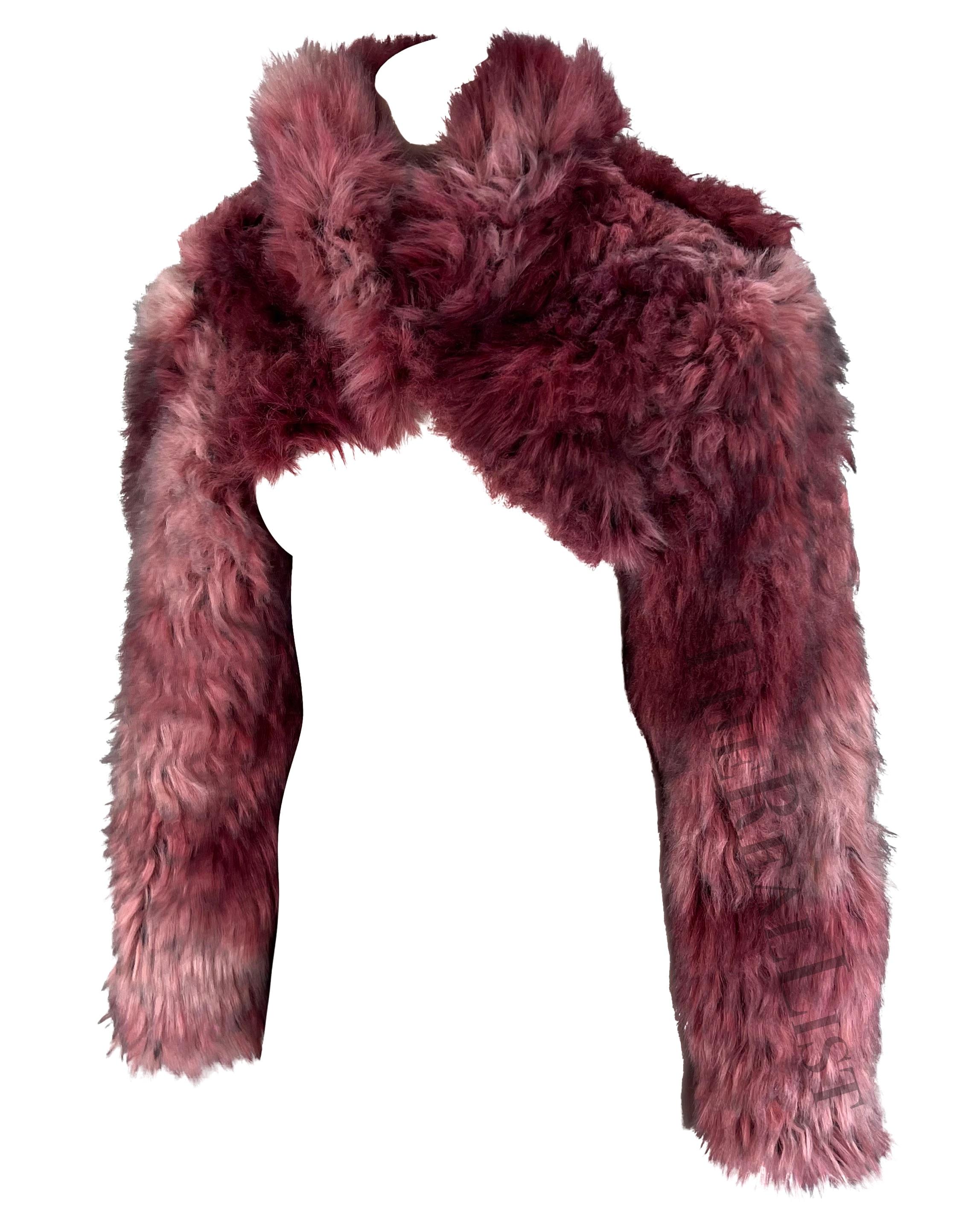 TheRealList presents: a fabulous pink faux fur Moschino Couture cropped bolero. From the Spring/Summer 1994 'Repetita Juvant' collection, this bolero is from the 10-year retrospective collection which was also Franco Moschino's final collection
