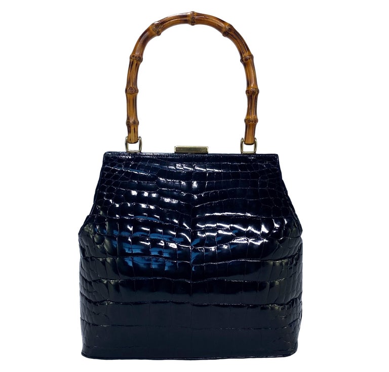Woman with Colorful Sequin Jacket and Blue Crocodile Leather Bag
