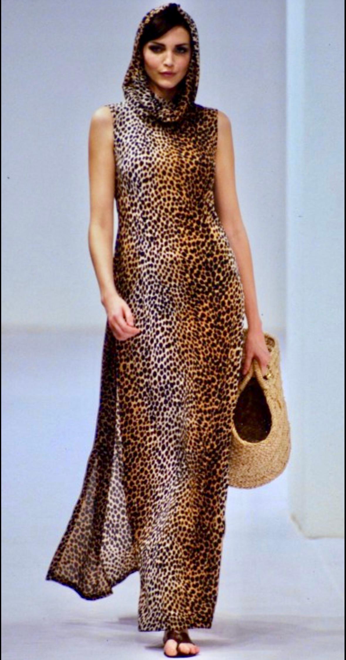 Presenting a fabulous cheetah print hooded Dolce and Gabbana dress from the Spring/Summer 1996 collection. A similar look debuted on the season’s runway, modeled by Nadja Auermann, and appeared in the season’s ad campaign on Linda Evangelista,