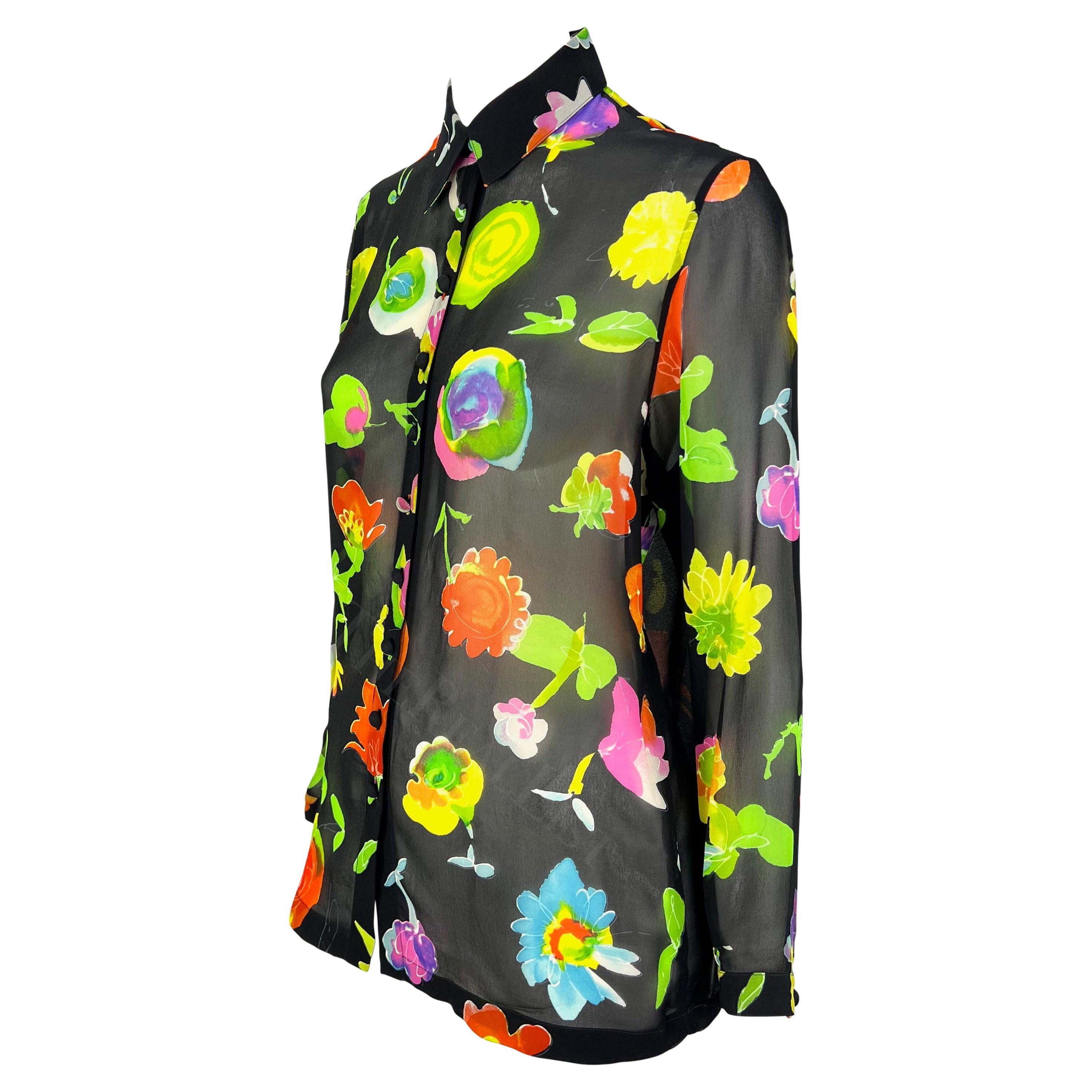 Presenting a fabulous black floral sheer Gianni Versace button-down shirt, designed by Gianni Versace. From the Spring/Summer 1996 collection, similar prints were heavily used on the season's runway. This loose-fitting top is  semi-sheer with a
