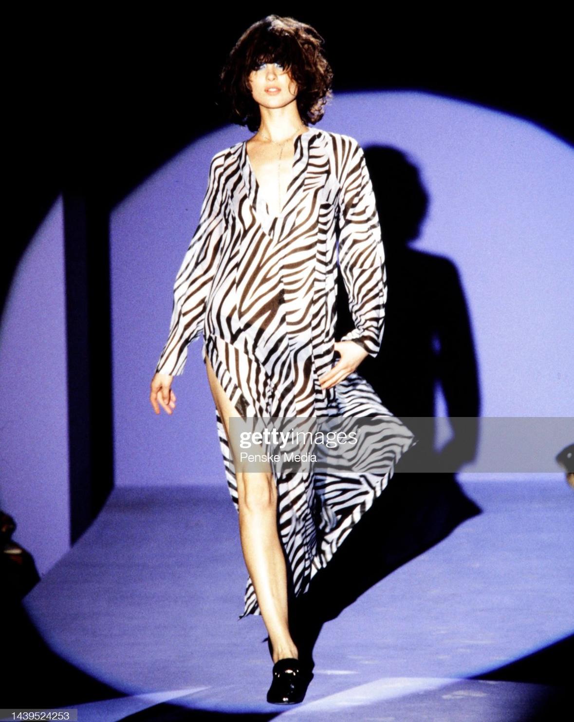 Presenting a fabulous zebra print Gucci tunic dress, designed by Tom Ford. From the Spring/Summer 1996 collection, this dress debuted on the season’s runway on Shalom Harlow and was also featured in the season’s ad campaign. Anneliese Seubert also