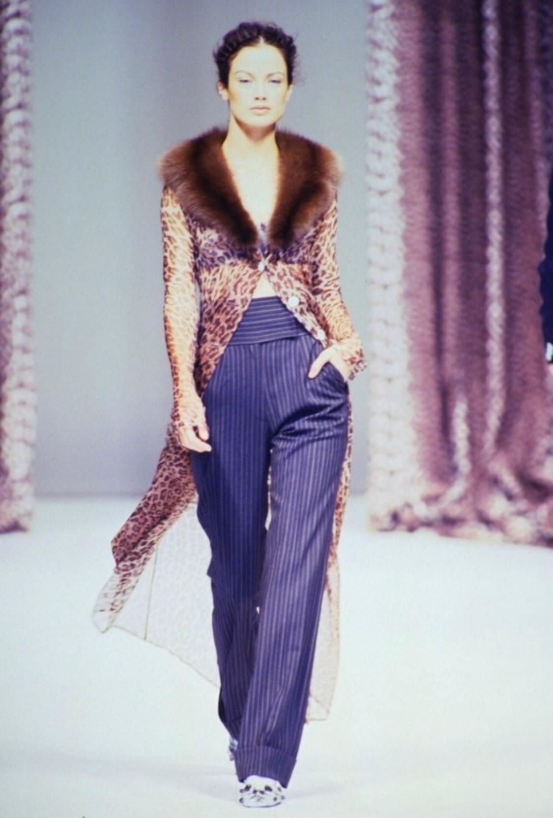 Presenting an amazing sheer cheetah print Dolce and Gabbana full-length cardigan. From the Spring/Summer 1997 collection, this cardigan debuted on the season's runway as look 2 modeled by Carolyn Murphy. The jacket was also highlighted in the
