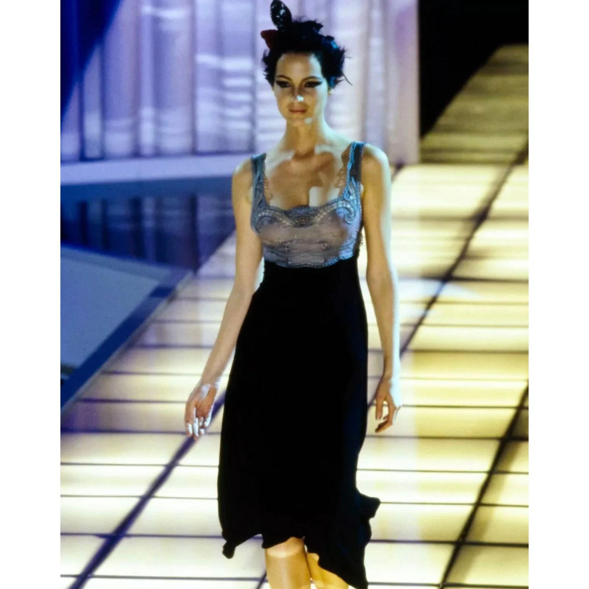 S/S 1997 Gianni Versace gray lace bust and black crepe silk midi dress. Lace embroidered, scalloped sleeveless bodice with concealed side zip closure. Fitted waist and flare hem is super flattering. As seen on the runway and in the ad campaign