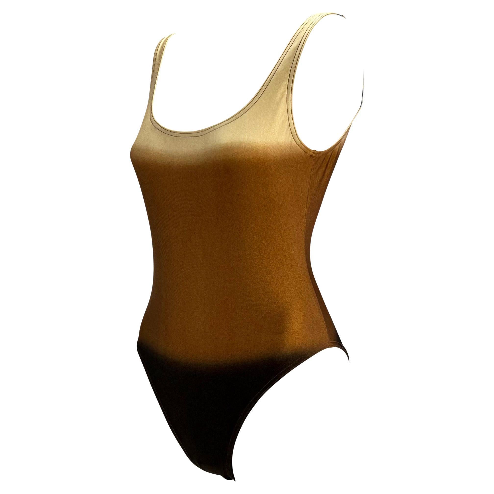 TheRealList presents: a gorgeous brown ombré Gucci one piece swimsuit, designed by Tom Ford. From the Spring/Summer 1997 collection, this bathing suit features a dark brown to cream ombré which was heavily used on other pieces in this collection.