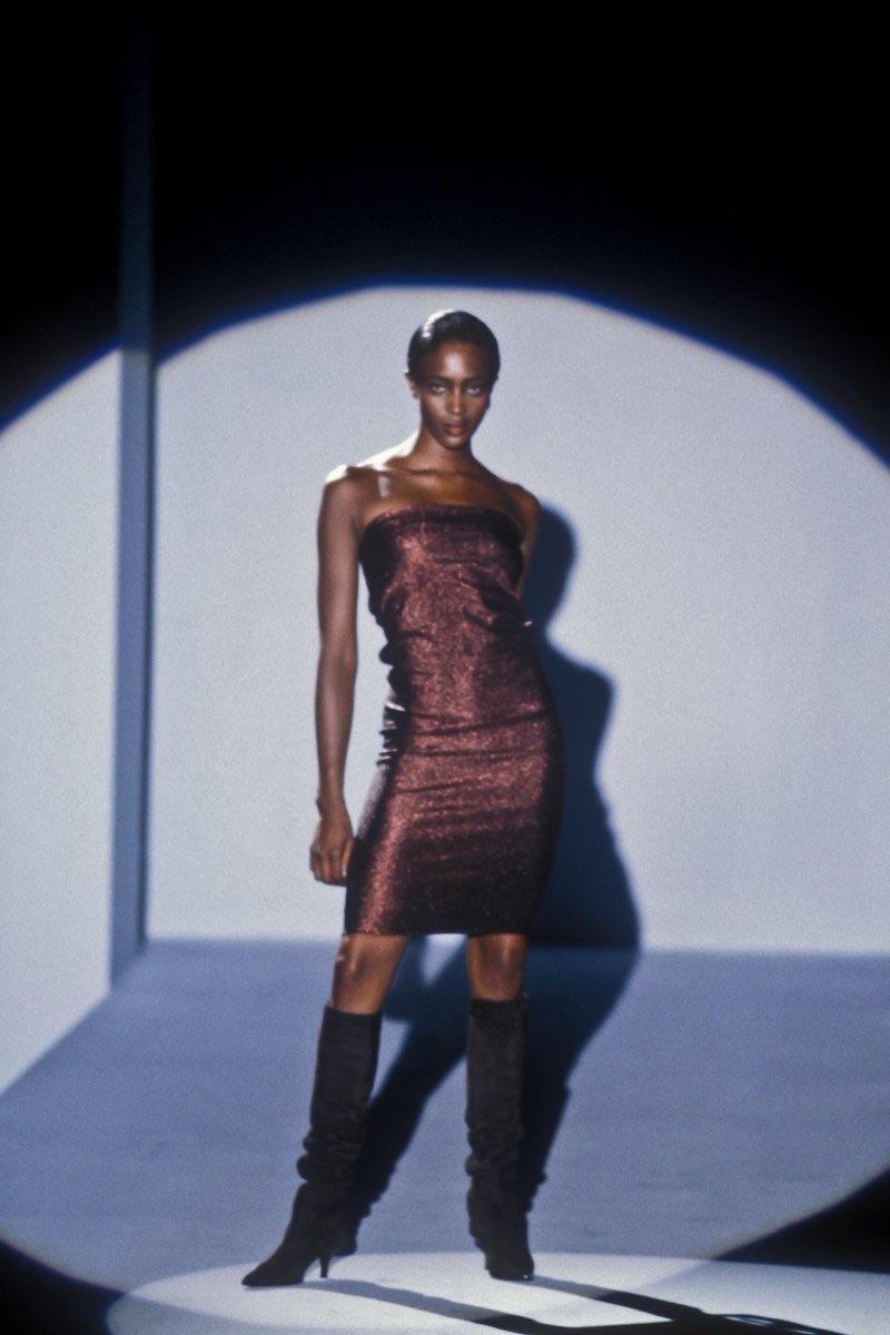 Presenting a mid-length dark copper metallic tube dress designed by Tom Ford for Gucci. This dress debuted on none other than Naomi Campbell as the finale of the Spring/Summer 1997 runway presentation. Make this dress your own by styling it with a