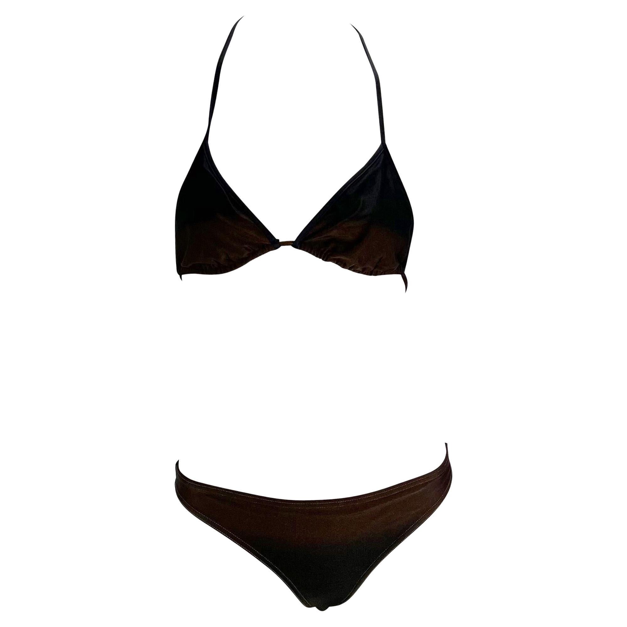 Presenting a gorgeous brown ombré Gucci bikini, designed by Tom Ford. From the Spring/Summer 1997 collection, these bikini bottoms debuted on the season's runway without the top. Both the top and bottom feature a black to brown ombré which was