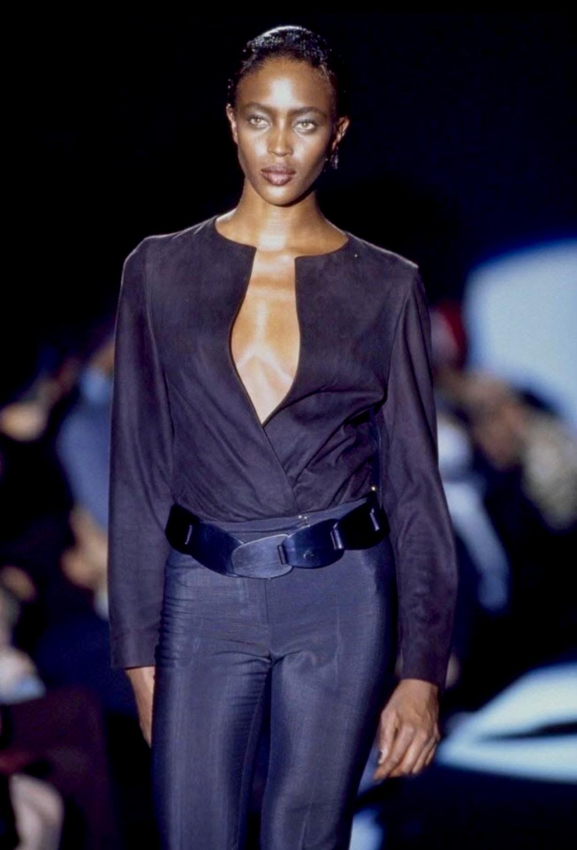 Presenting a fabulous brown suede Gucci open blouse/jacket, designed by Tom Ford. From the Spring/Summer 1997 collection, this beautiful blouse or jacket debuted on the season's runway modeled by Naomi Campbell. Constructed entirely of dark brown