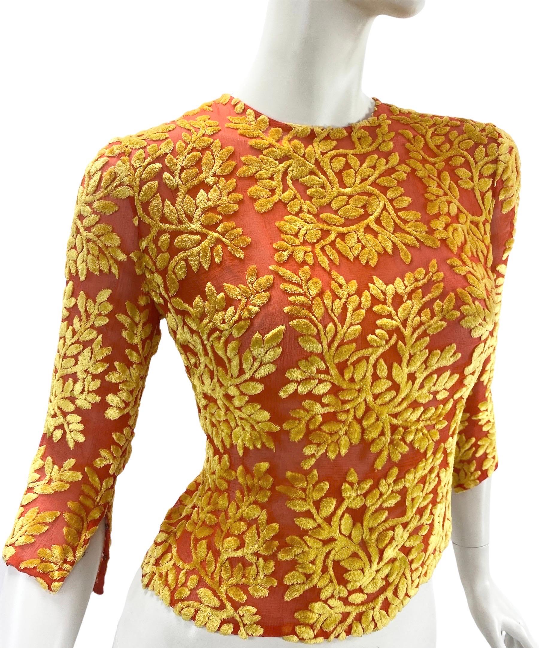 Vintage Gianni Versace Couture Floral Devore Velvet Shirt
1997 Collection
Italian size 40 - US 4
Orange silk chiffon with yellow velvet, Side zip, 3/4 Sleeves.
Measurements: Bust 34 inches, sleeve 16