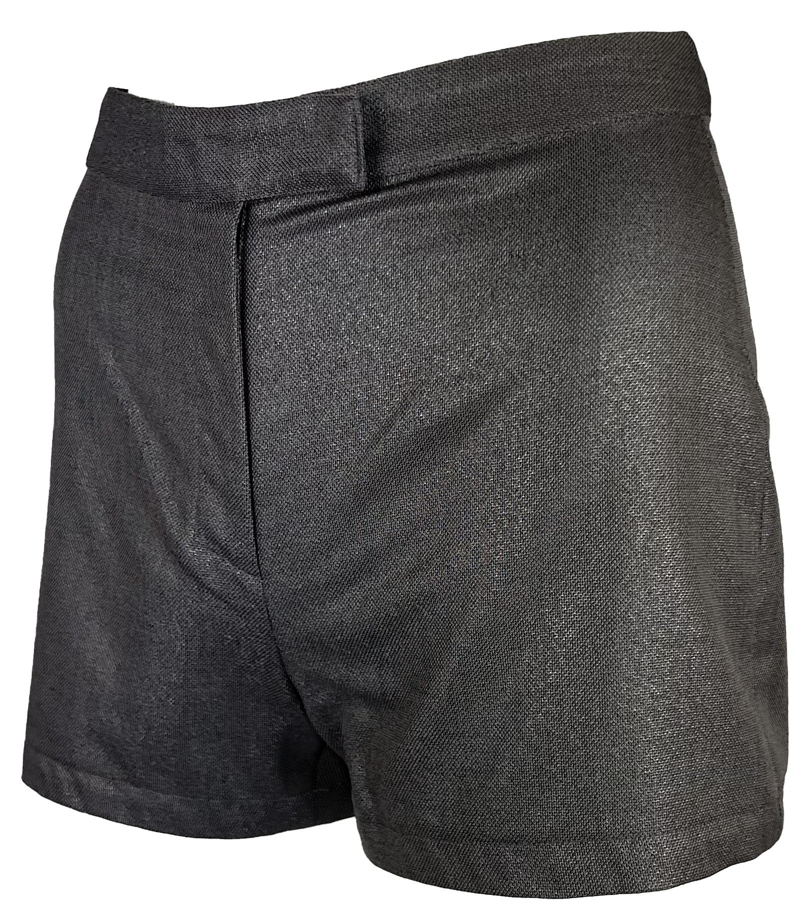 Donatella designed these metallic mini shorts for the Spring/Summer 1998 Gianni Versace collection. The short shorts feature a high waist and are the perfect chic and sparkly hot pants. 

Approximate measurements:
Size - 38IT/4US
Waistband to hem: