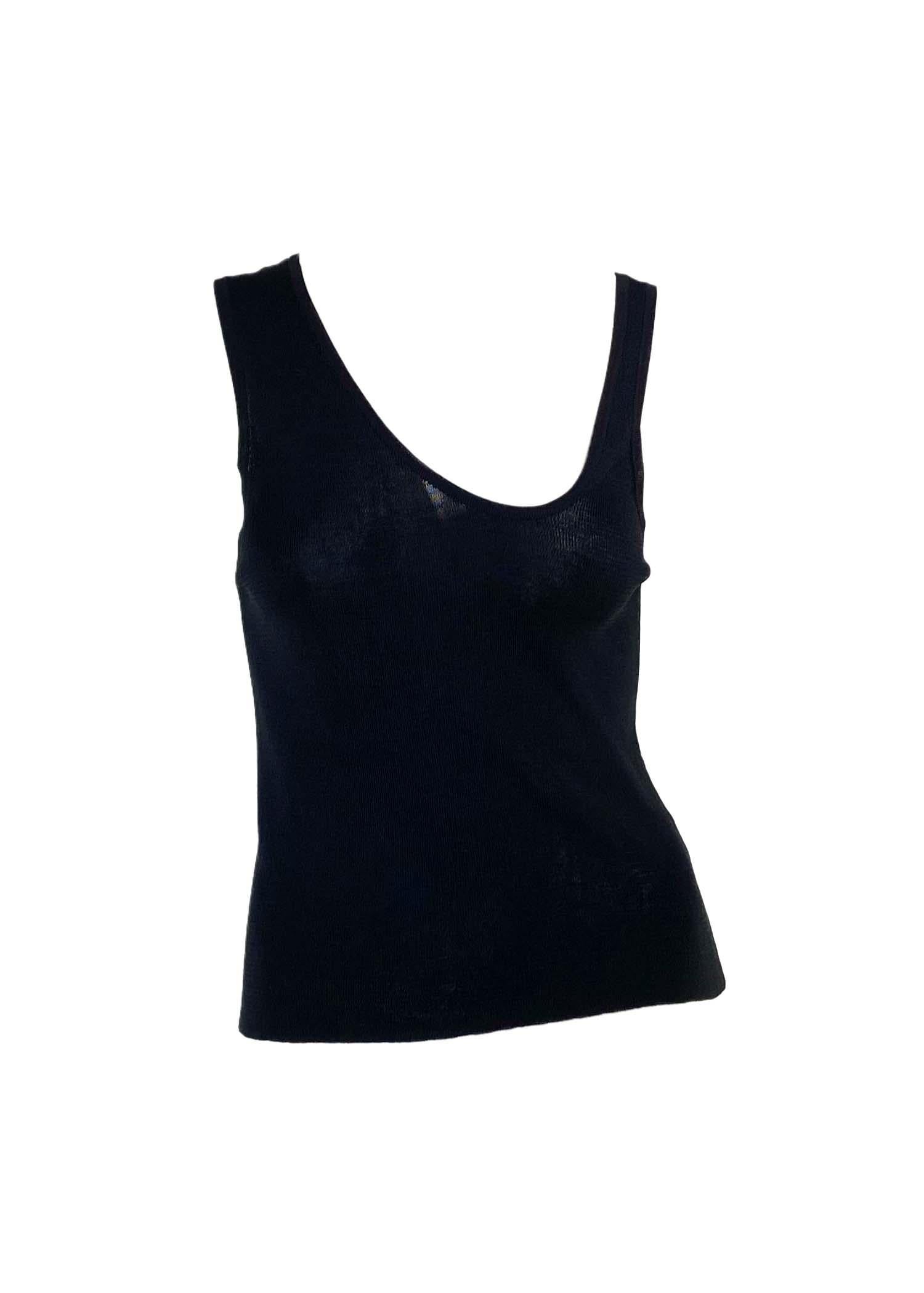 TheRealList presents: an asymmetric Gucci tank top, designed by Tom Ford. This uniquely shaped tank top features an asymmetrical design with a deep neckline. Not your average tank top, this shirt was designed for the Spring/Summer 1998 collection
