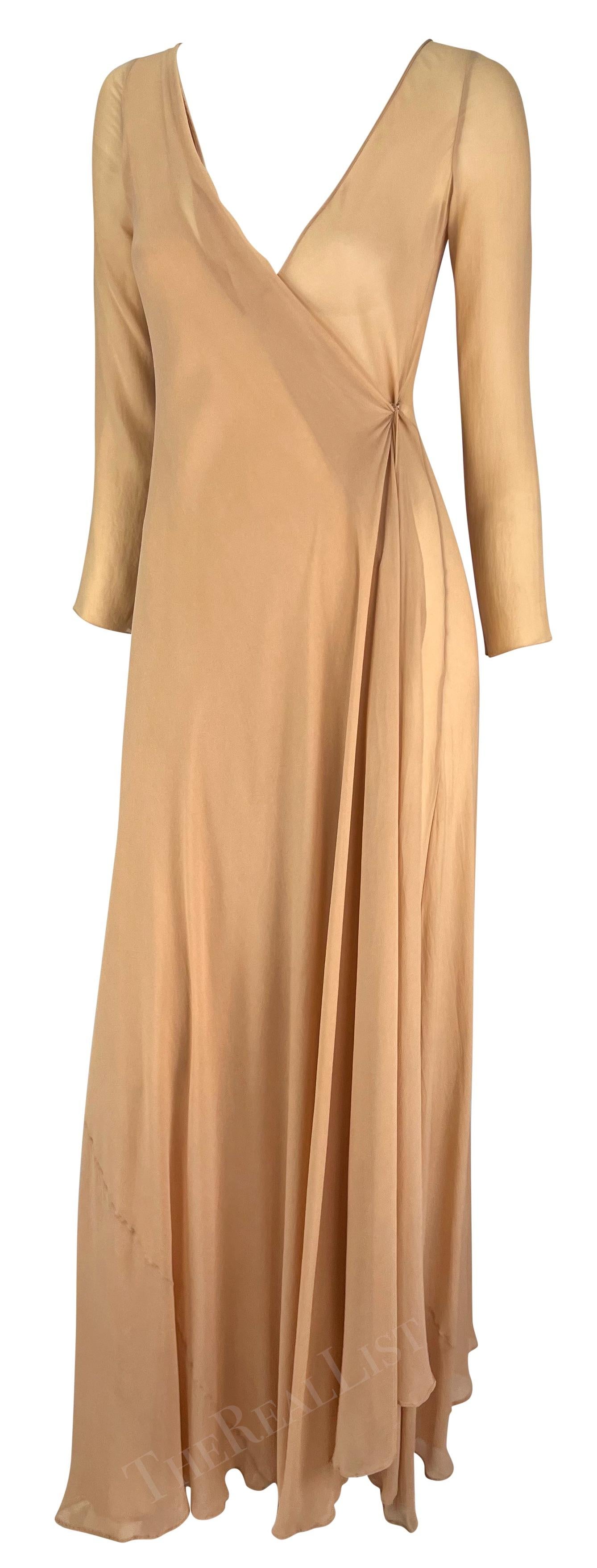 Presenting a stunning beige prototype Gucci wrap gown, designed by Tom Ford. From the Spring/Summer 1998 collection, this elegant gown was produced as a sample. This ultra-rare sample piece is constructed entirely of lightweight sheer chiffon. The