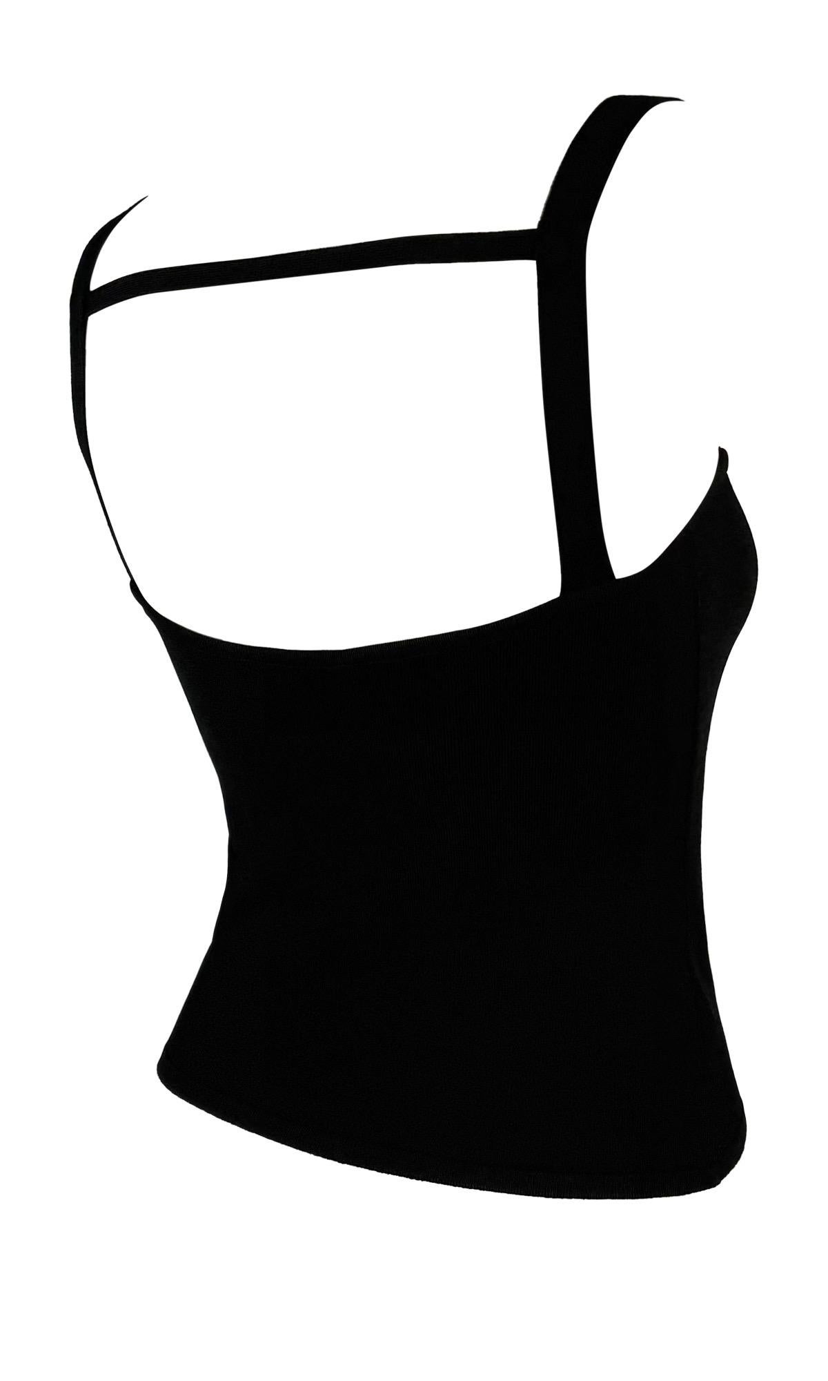 This Spring/Summer 1998 Gucci by Tom Ford black bodycon stretch strap tank top is a sleek and minimalist design. Crafted from stretchy, form-fitting fabric, it features thin straps and a modern squared neckline with a unique back strap detail. 