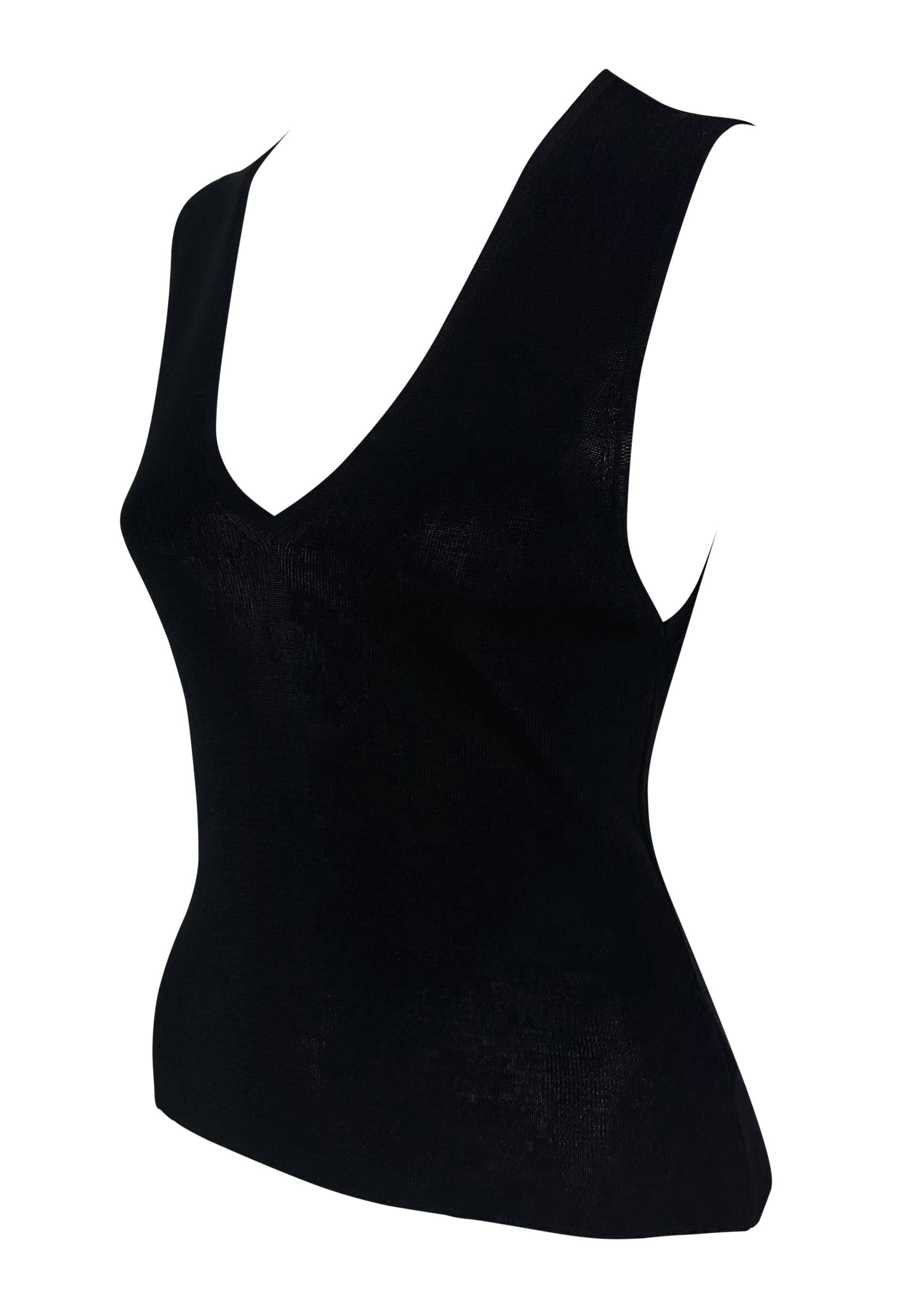 This chic black sleeveless knit top by Gucci, designed by Tom Ford for the Spring/Summer 1998 season, features a deep plunging v-neckline. Simple yet stylish, it's a timeless piece from Ford's era at Gucci.

Approximate measurements:
Size -