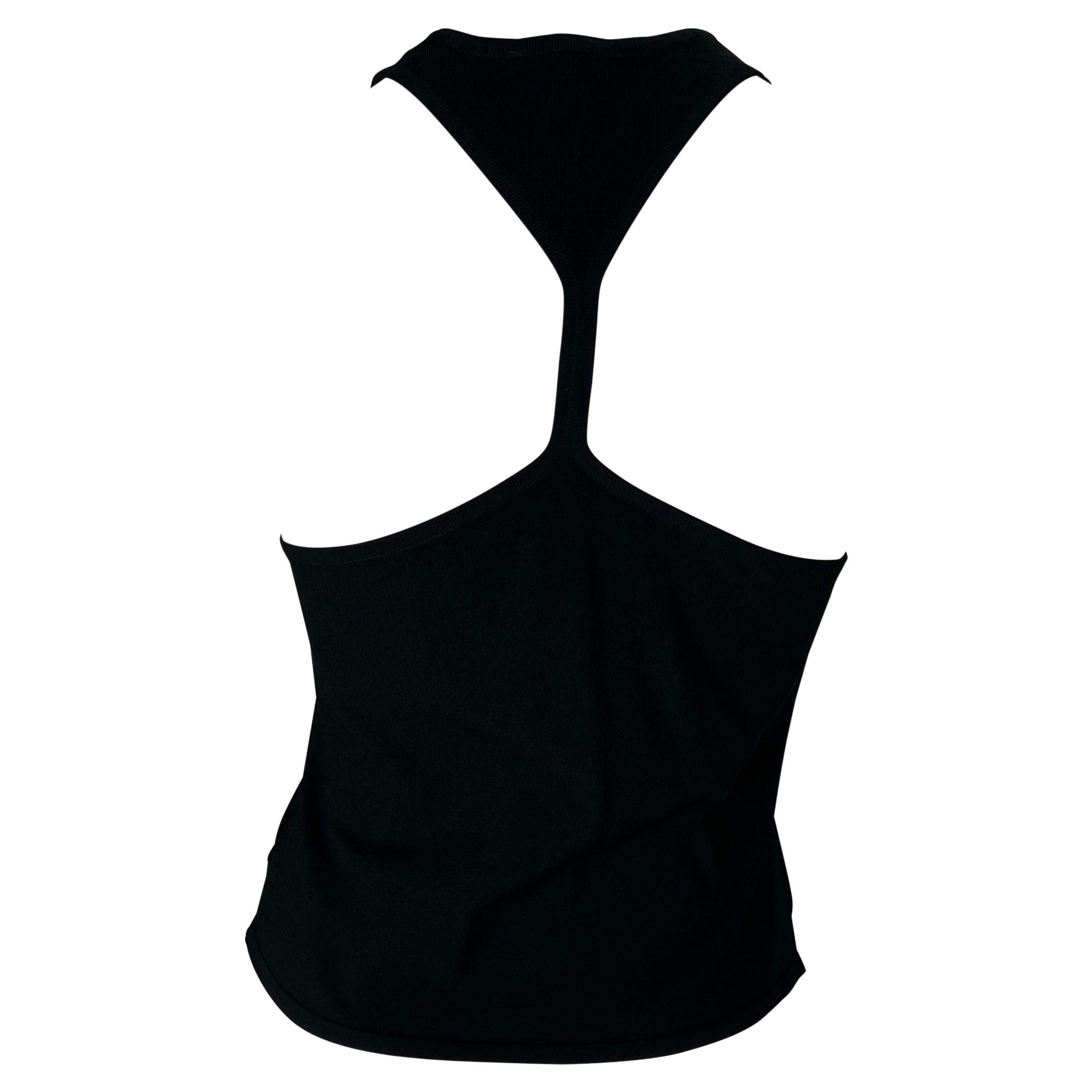 Presenting a sleek Tom Ford designed take on a Gucci racerback tank top. The fitted tank top features a high v-neck in the front and a tight racerback. This top was created by Tom Ford for the Spring/Summer 1998 collection and is the perfect chic