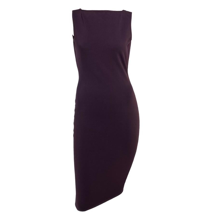 Presenting two-in-one, this dress can be worn with either an exposed back or a plunging neckline. Sexy and versatile, this dress represents one of Tom Ford's most popular and iconic collections during his tenure at Gucci. Check out our storefront