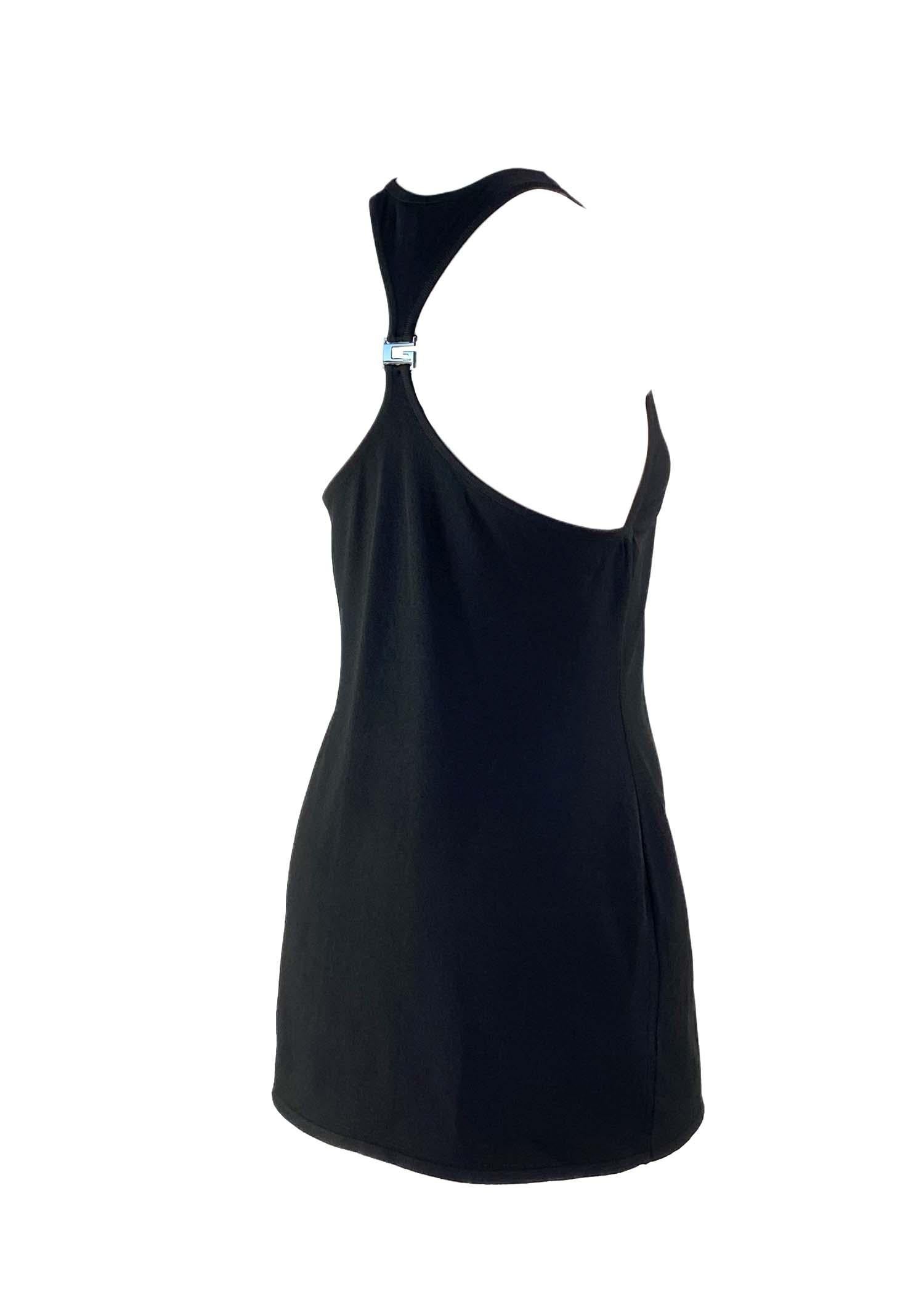 TheRealList presents: a beautiful knit racerback Gucci mini dress, designed by Tom Ford. From the Spring/Summer 1998 collection, this dress features a high neckline, racerback, and a square 'G' logo adornment. This simple and sexy black dress is the