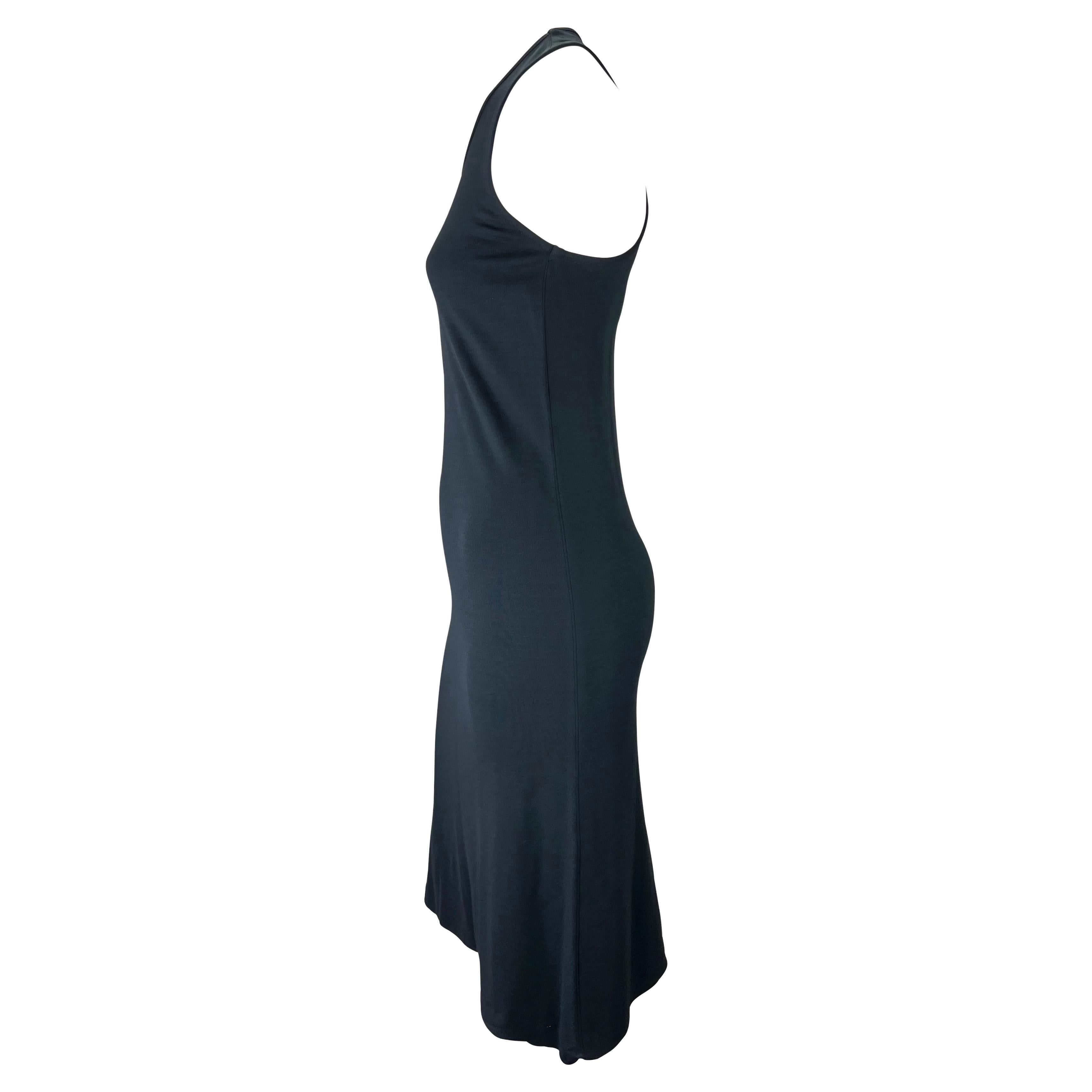 TheRealList presents: a rare sample navy racerback Gucci dress, designed by Tom Ford. A rare sample piece from the Spring/Summer 1998 collection, this  formfitting viscose dress features a scoop neckline and racerback. Simple and effortlessly chic,
