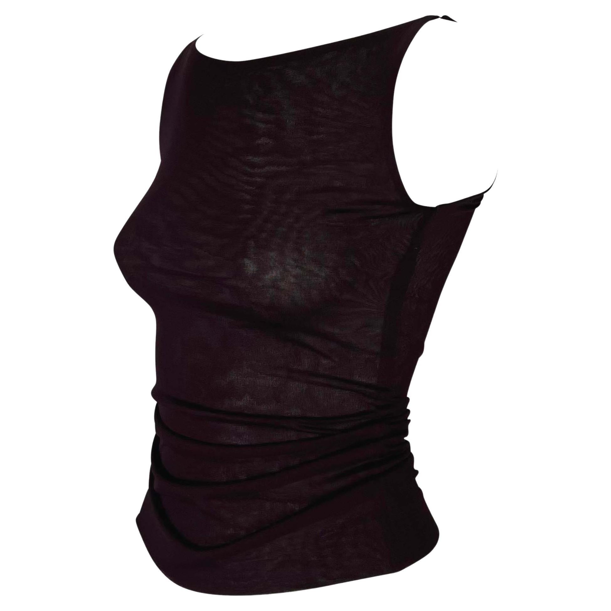 TheRealList presents: a beautiful purple stretch Gucci tank top, designed by Tom Ford. From the Spring/Summer 1998 collection, this effortlessly chic semi-sheer top features a wide Sabrina-style neckline and narrowly meets at the top of the