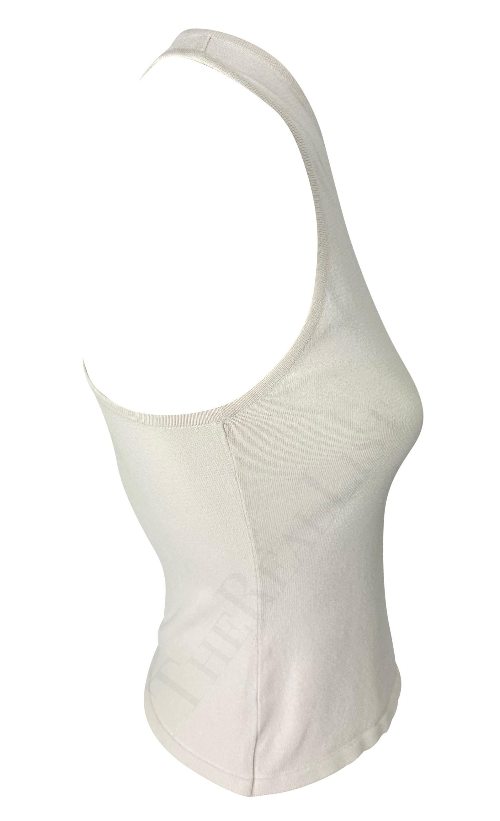 TheRealList presents: a sleek Tom Ford designed take on a Gucci racer back tank top. The fitted tank top features a high v-neck in the front and a tight racerback. This top was created by Tom Ford for the Spring/Summer 1998 collection and is the