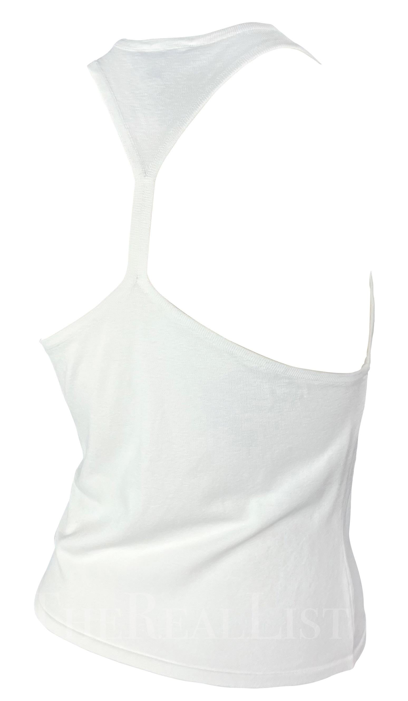 Presenting a white Gucci tank top, designed by Tom Ford. From the Spring/Summer 1998 collection, this top features a high v-neck and a racerback. This fabulous Gucci by Tom Ford top offers a stylishly refined upgrade to an essential