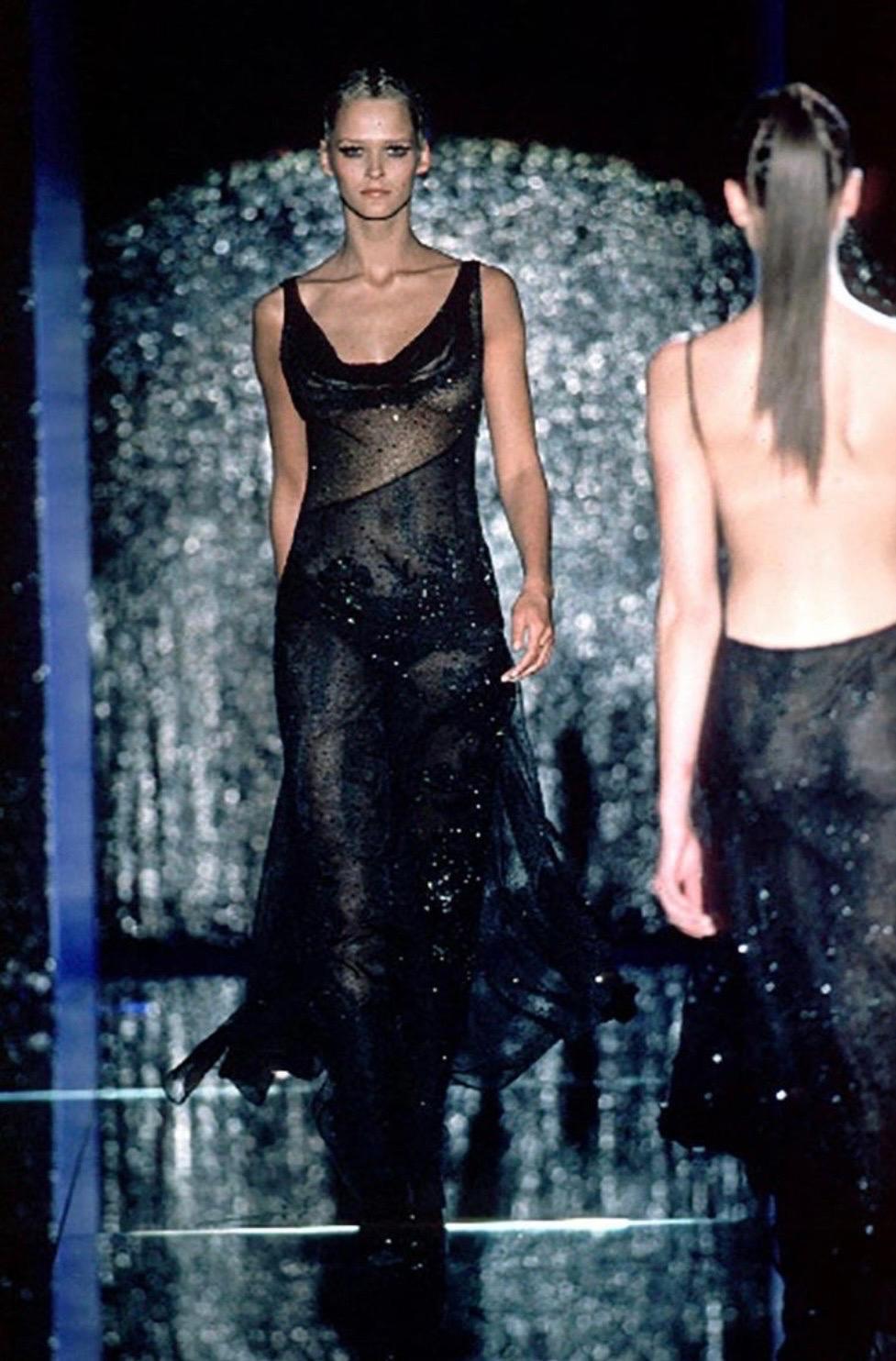 Versace ATELIER  Runway Black Beaded Gown
S/S 1999 Collection
Italian Size 38 - US 4  
Actual Runway sample worn by Carmen Kaas 
Color: Black   
Retail back in 1999 was $57,600 
Measurements: Length 62 inches,
Made in Italy.  
