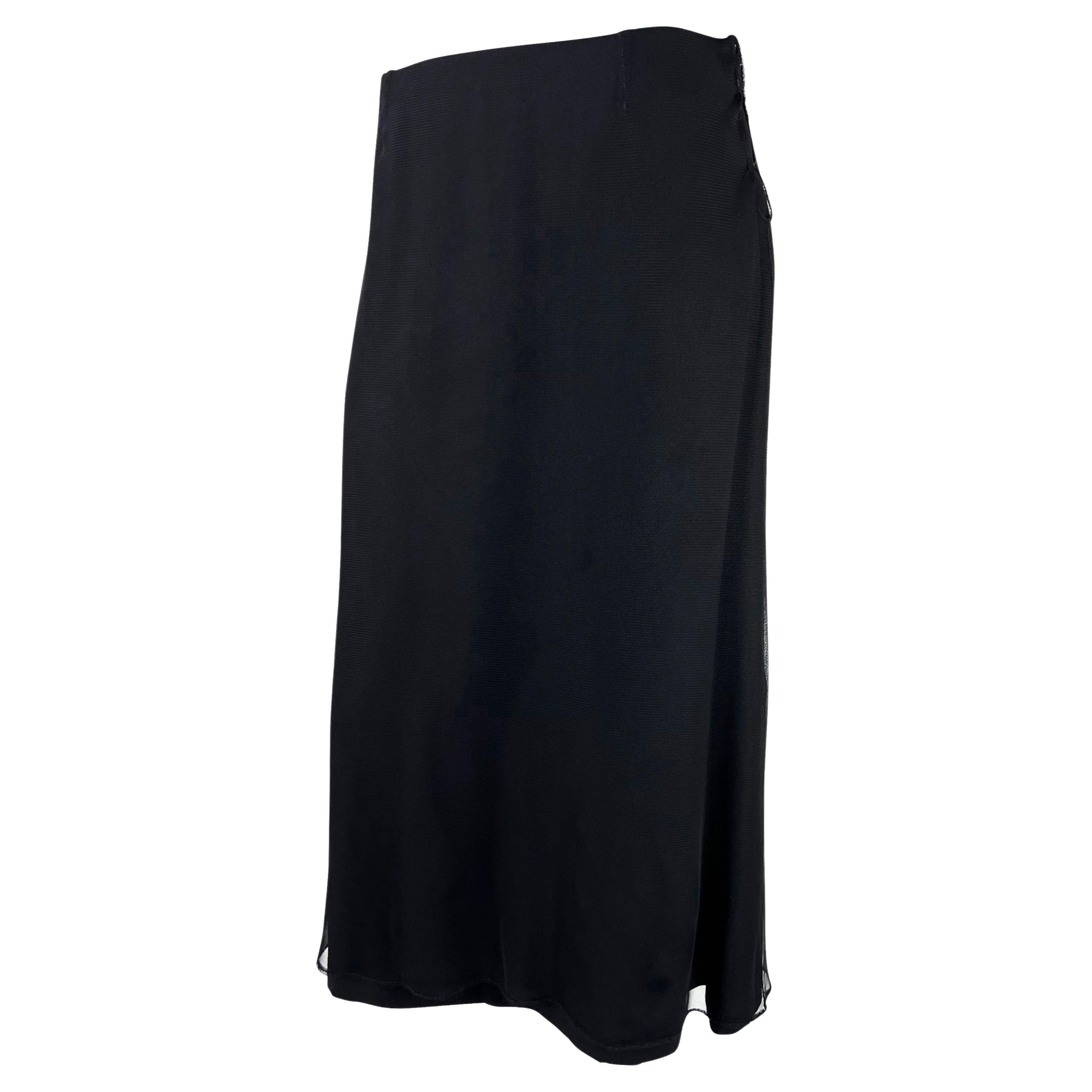 Presenting a black tulle Gucci skirt, designed by Tom Ford. From the Spring/Summer 1999 collection, this skirt was produced in limited numbers as a sample for the collection, making it a rare Gucci by Tom Ford piece. The skirt is constructed of a