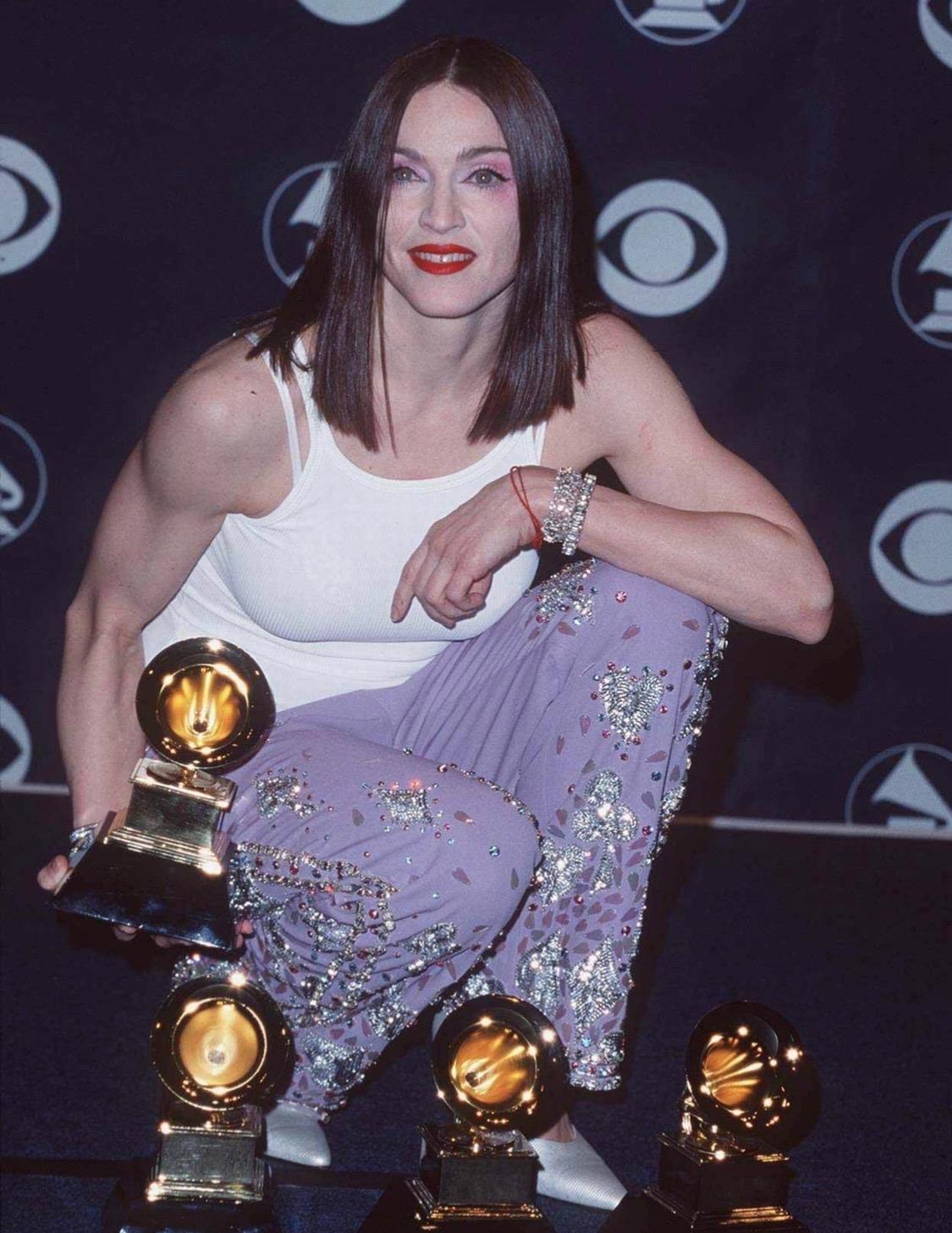 Presenting an unbelievable pair of rhinestone embellished lavender wool pants from Tom Ford's famous 'Las Vegas hippy' collection with Gucci. Most famously worn by Madonna to the 1999 Grammys, where she opened the show and left with four awards, and