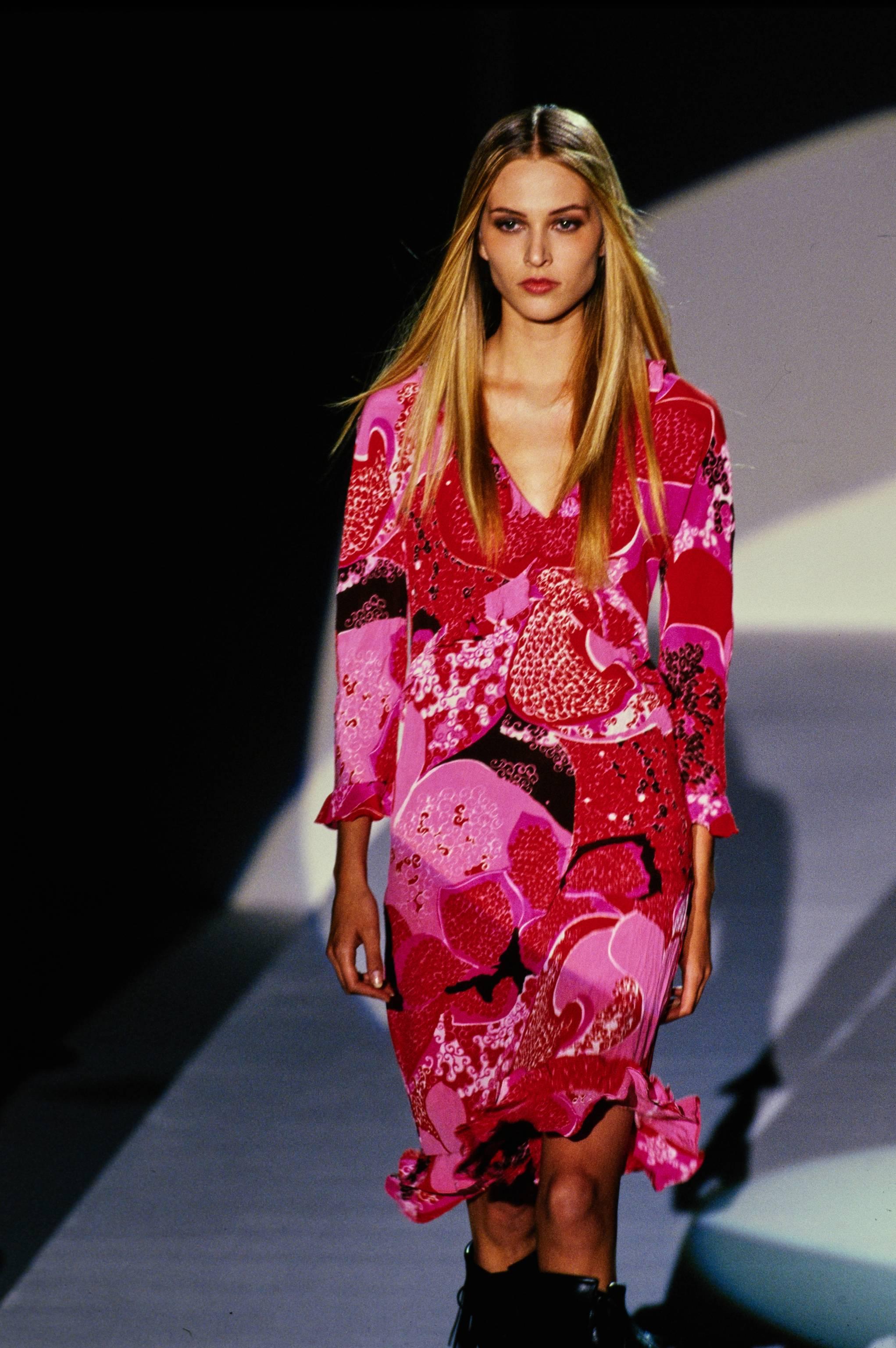 Presenting an 'Acid Flower' silk button-up top in pink from Tom Ford's 'Las Vegas Hippy' collection for Gucci. The S/S 1999 collection is remembered for its drastic departure from Tom Ford's signature sleek minimalism. After the success of his