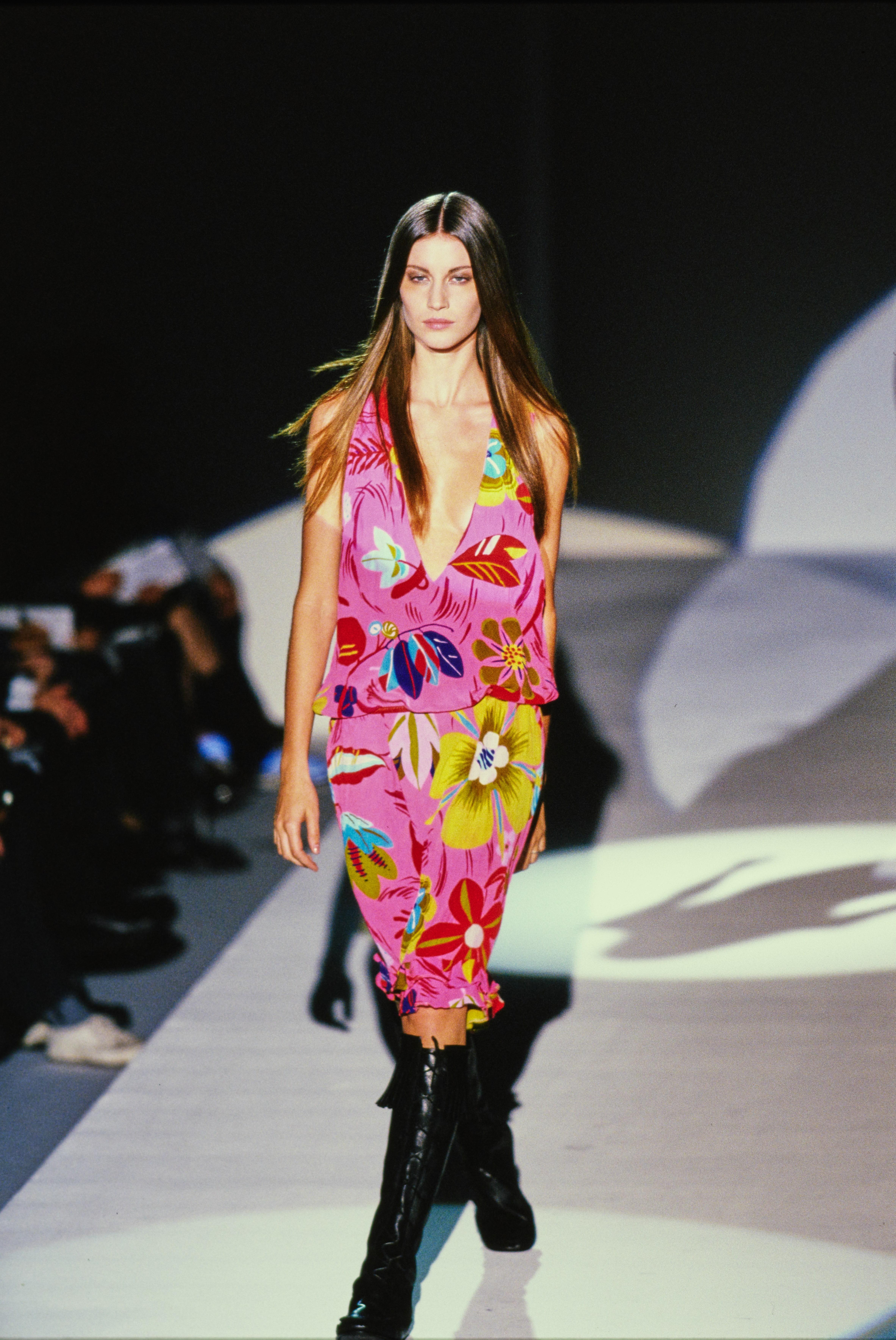 Presenting a colorful psychedelic bag from Tom Ford's famous 'Las Vegas hippy' collection with Gucci. The S/S 1999 collection is remembered for its drastic departure from Tom Ford's signature sleek minimalism. After the success of his earlier