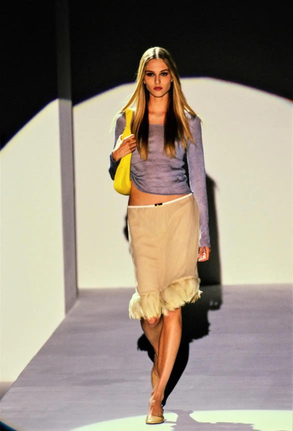 This stunning black sheer silk chiffon Gucci skirt, designed by Tom Ford, is from the Spring/Summer 1999 collection. The skirt debuted on the runway in beige and was featured in the season's ad campaign, photographed by Mario Testino. Another shot