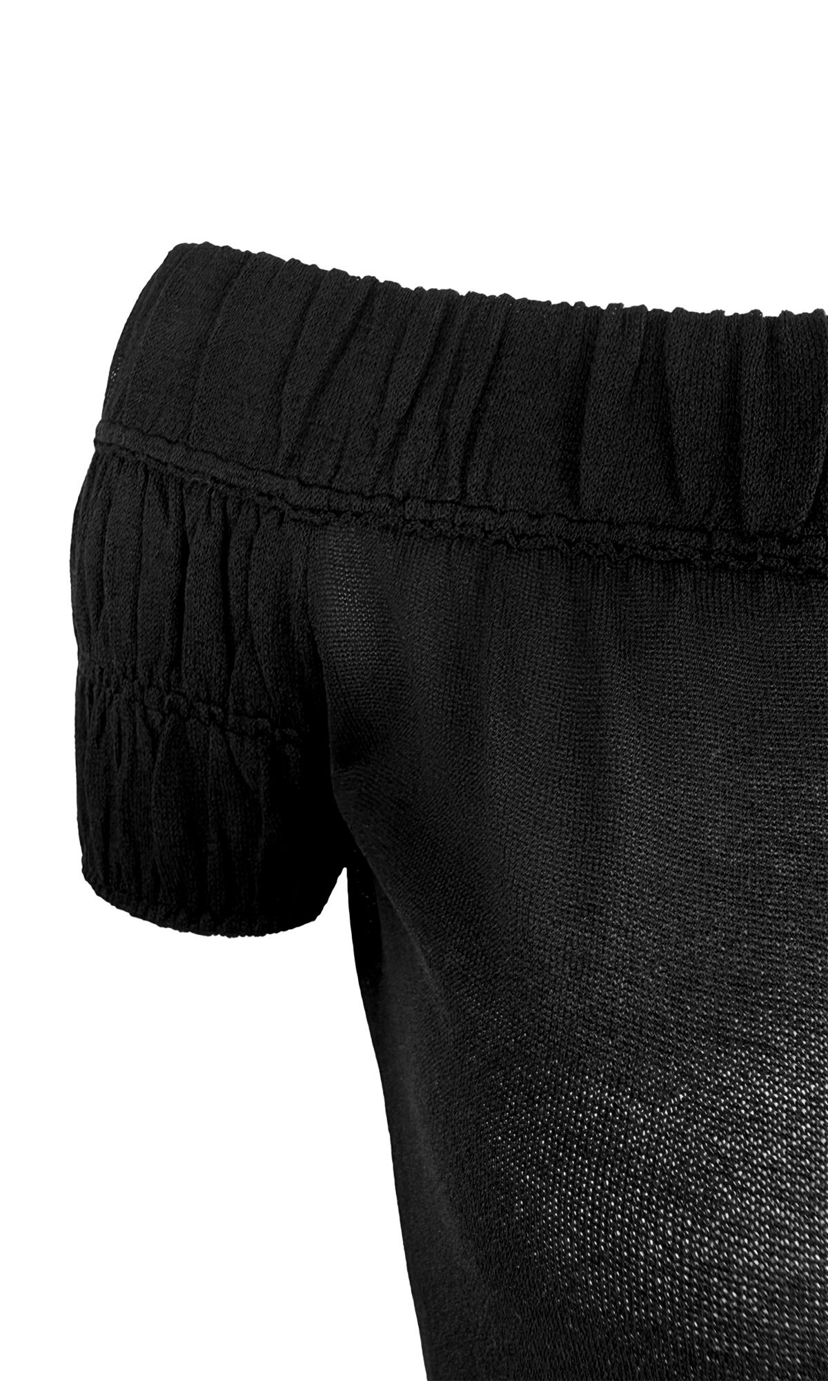 This Gucci by Tom Ford off-the-shoulder top, from the Spring/Summer 1999 collection, is crafted from a sheer black silk knit and features a fitted silhouette. 

Approximate measurements:
Size - M
Bust: 34