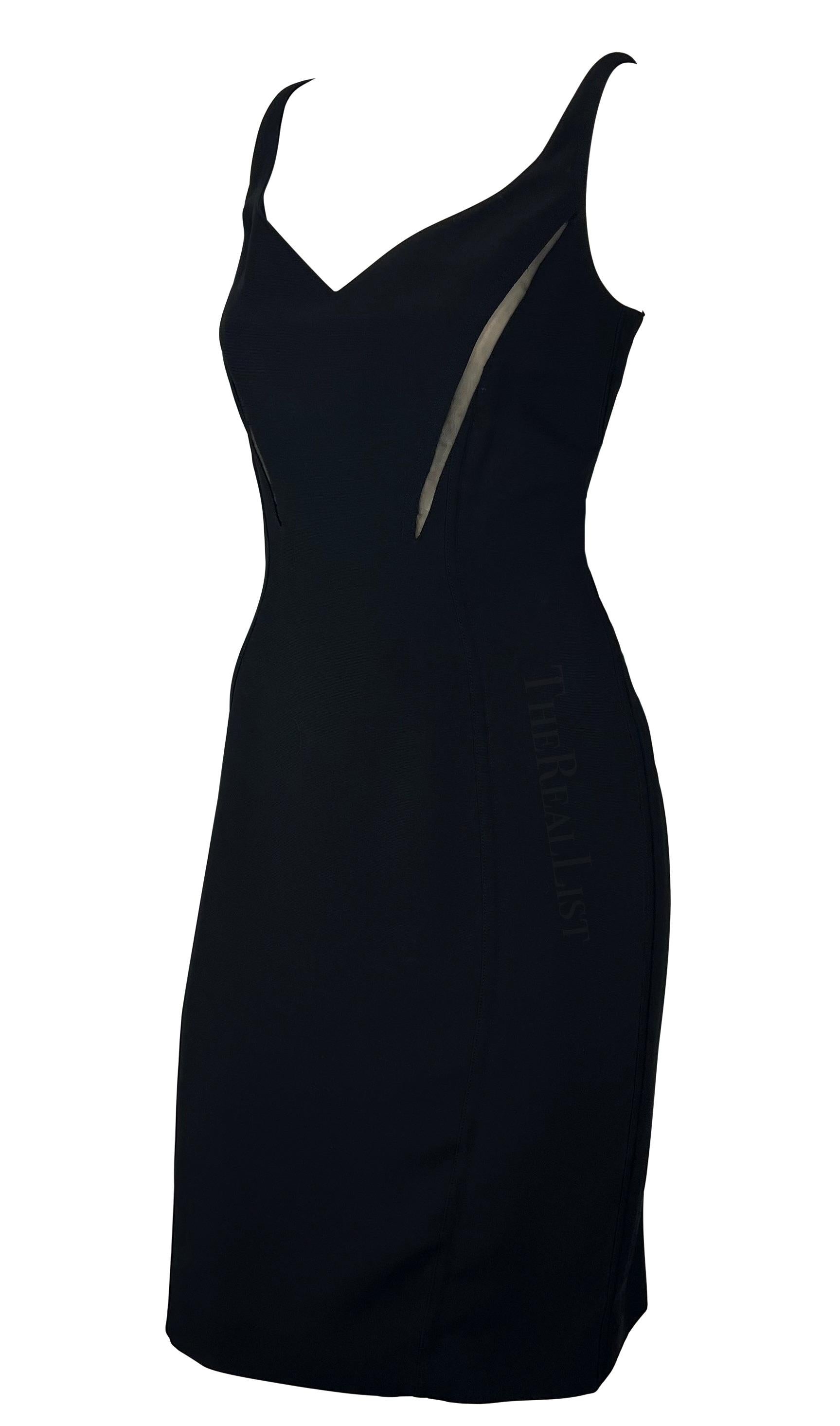 Presenting a fabulous black Thierry Mugler mini dress, designed by Manfred Mugler. From the Spring/Summer 1999 collection, this sleeveless mini dress features a sweetheart neckline and is made complete with two mesh-covered cutouts at either side of