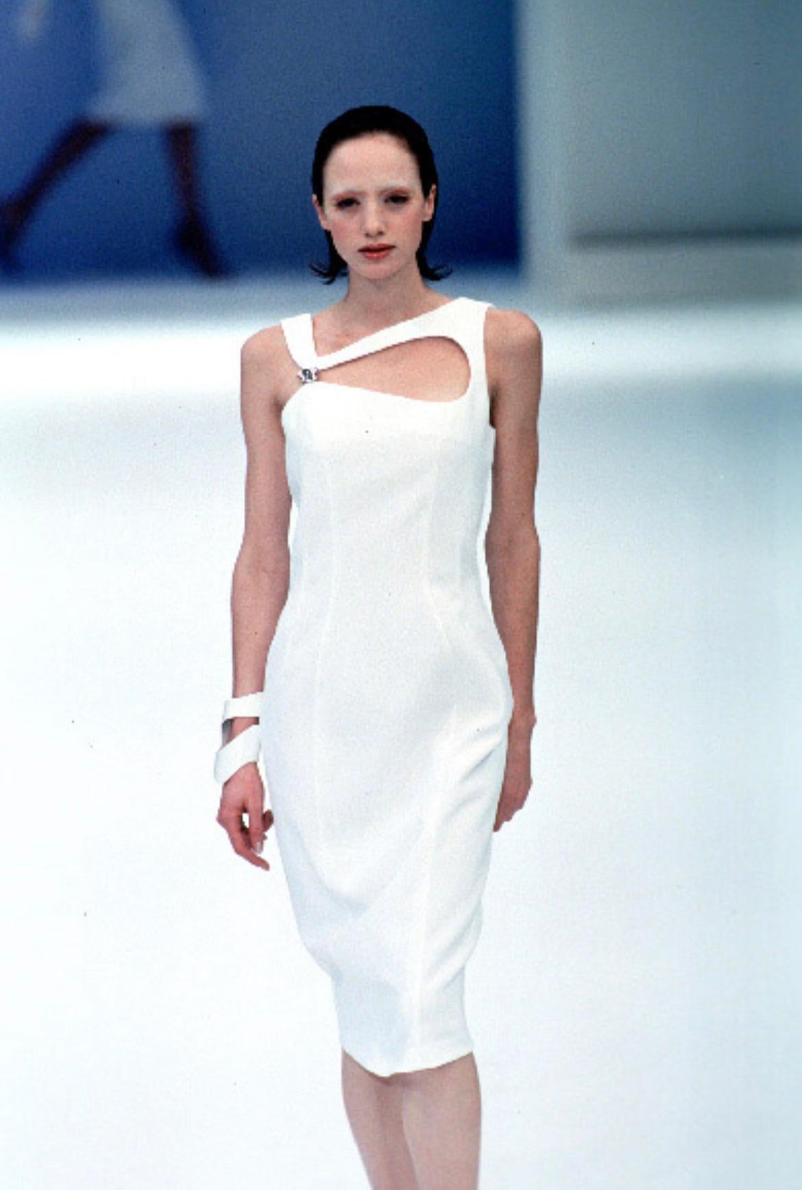 Presenting a beautiful black and silver Thierry Mugler gown, designed by Manfred Mugler. From the Spring/Summer 1999 collection, a shortened version of this unique gown debuted on the season's runway in all white and in all black. Featuring an