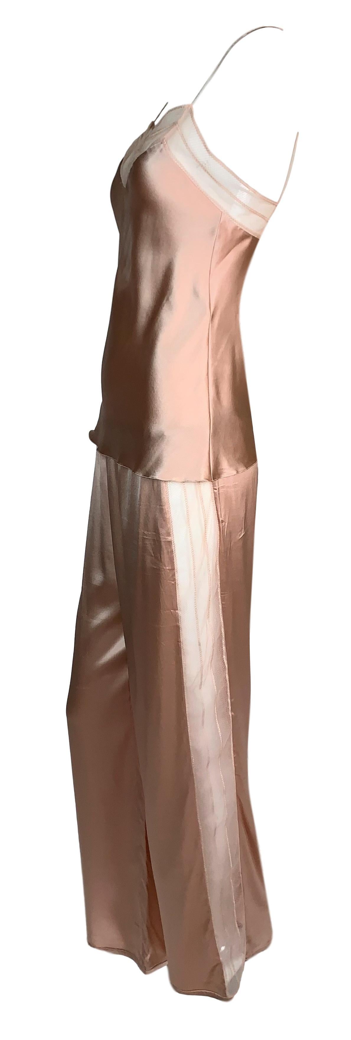 DESIGNER: 2000's Christian Dior by John Galliano

Please contact for more information and/or photos.

CONDITION: Good- faint water mark on top- please see last photo. 

FABRIC: Silk

COUNTRY MADE: France

SIZE: 36

MEASUREMENTS; provided as a