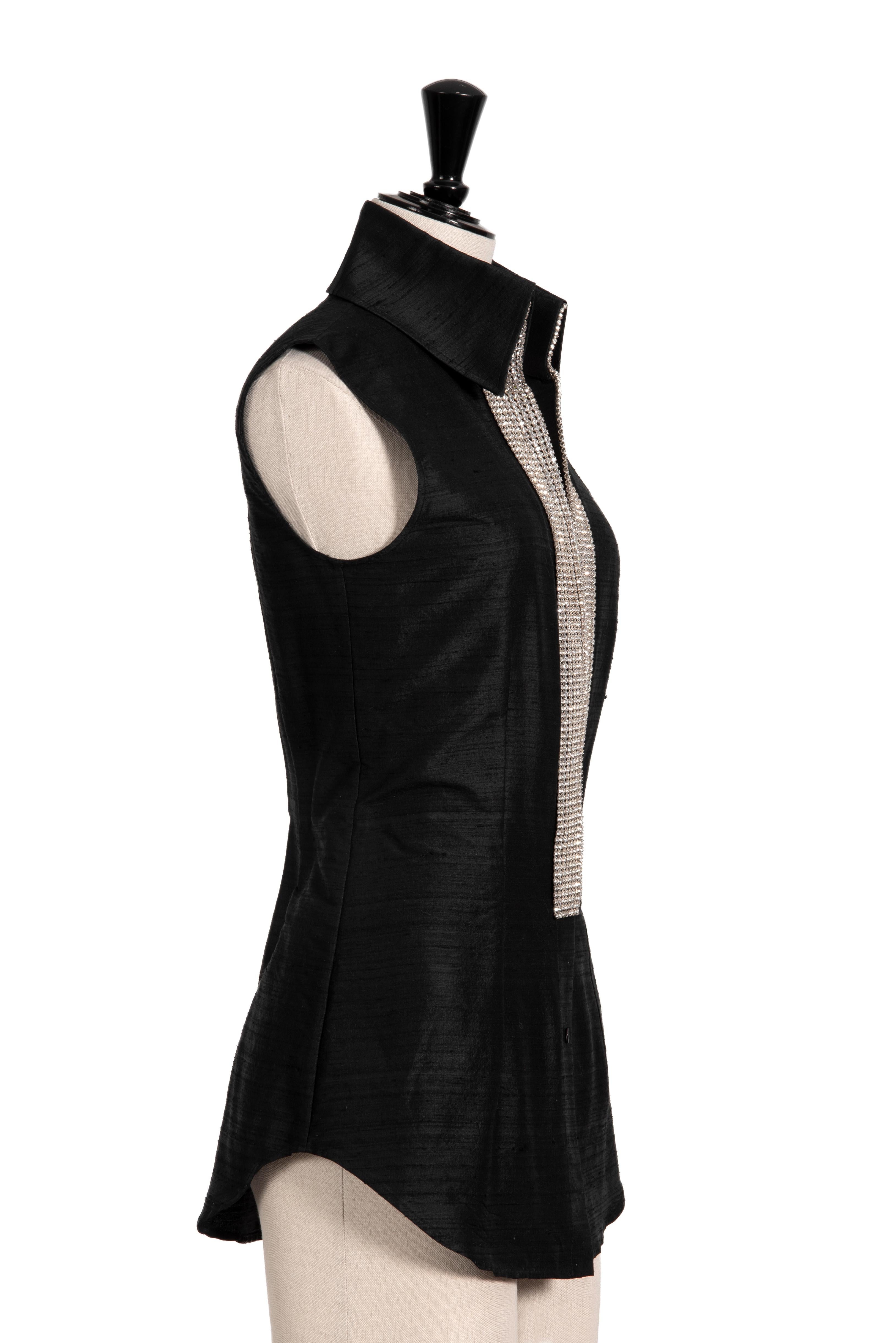 Glamorous elegance at its best! Here we have a sophisticated rhinestone embellished black Dolce & Gabbana raw silk top from the design duos iconic Spring/Summer 2000 collection.

Details
• A rare and hard-to-find true vintage piece by Dolce &