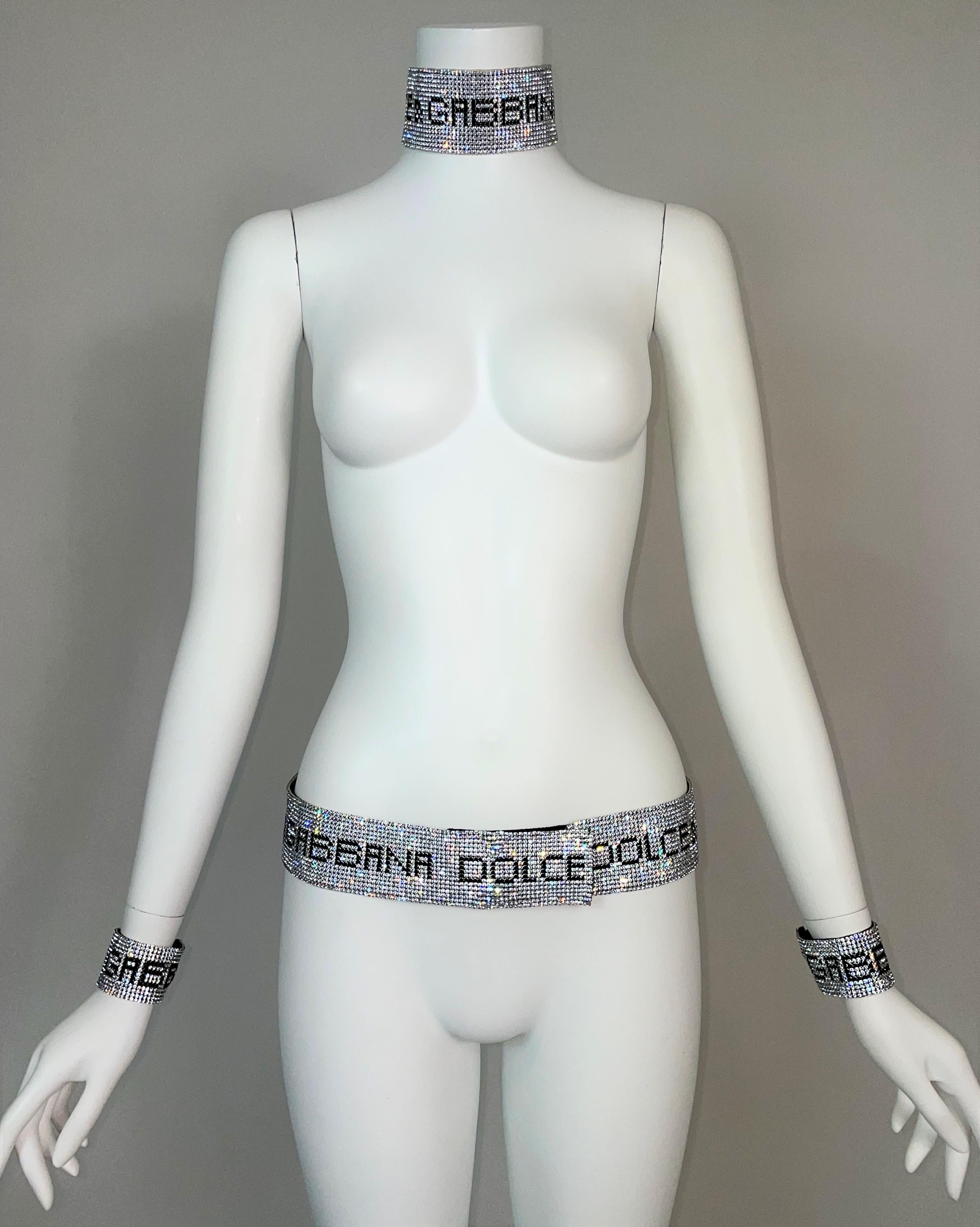 DESIGNER: S/S 2000 Dolce & Gabbana

Please contact us for more images and/or information.

CONDITION: Good- only faint color on lining of belt just from time

FABRIC: Crystal- Metal- Silk

COUNTRY: Italy