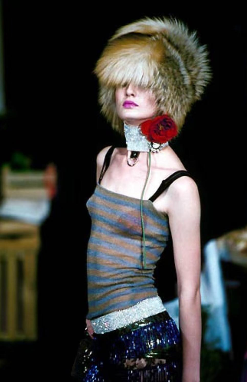 This rhinestone-covered Dolce & Gabbana belt from the Spring/Summer 2000 collection was a standout in numerous runway looks and prominently featured in the season’s ad campaign. Adorned with dazzling clear rhinestones, this statement piece is