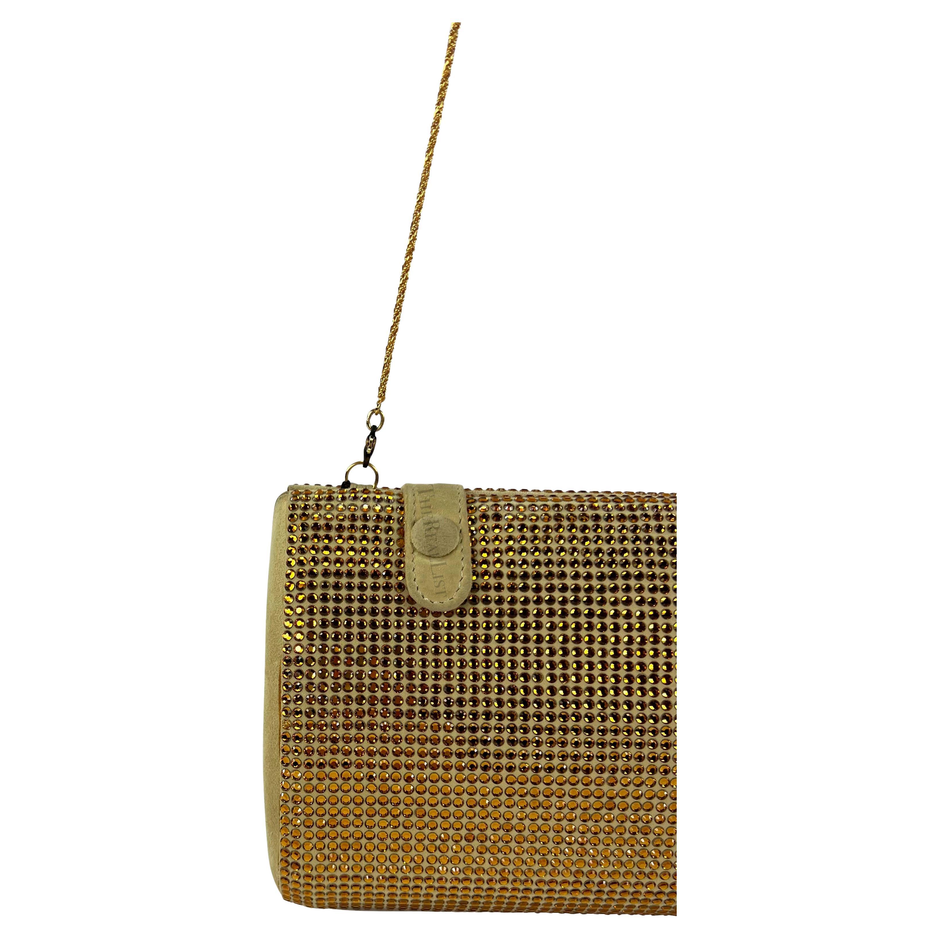 Presenting a fabulous tan suede gold rhinestone Gianni Versace convertible clutch, designed by Donatella Versace. Make a bold statement with this amazing Gianni Versace convertible clutch from the Spring/Summer 2000 collection. Seen on the runway in