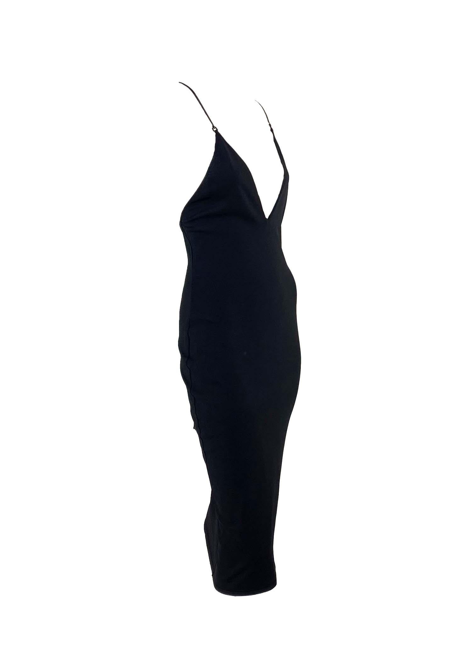 TheRealList presents: a gorgeous leather strapped backless Gucci dress, designed by Tom Ford. This knit form fitting dress features a deep v-neckline which is held up by long leather straps that wrap around the open back. From the Spring/Summer 2000