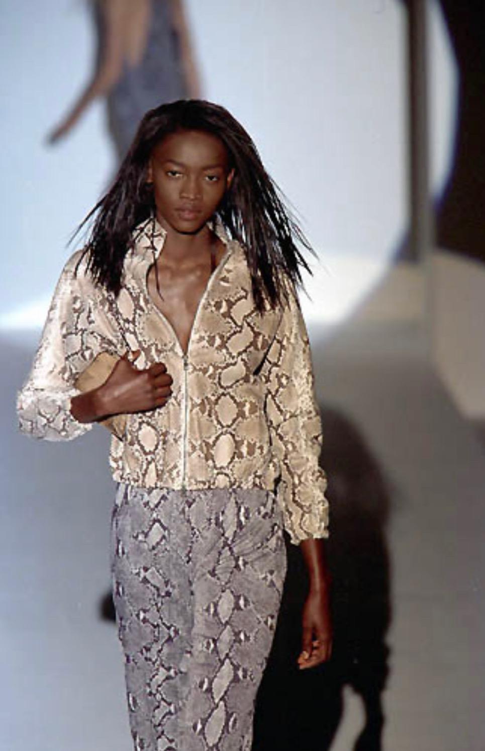 Presenting a fabulous grey snake print Gucci pant set, designed by Tom Ford. From the Spring/Summer 2000 collection, the season's runway was covered in the identical snakeskin print as this set with the pants debuting on the season's runway as part