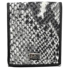 S/S 2000 Gucci by Tom Ford Preservativo con estampado de serpiente gris