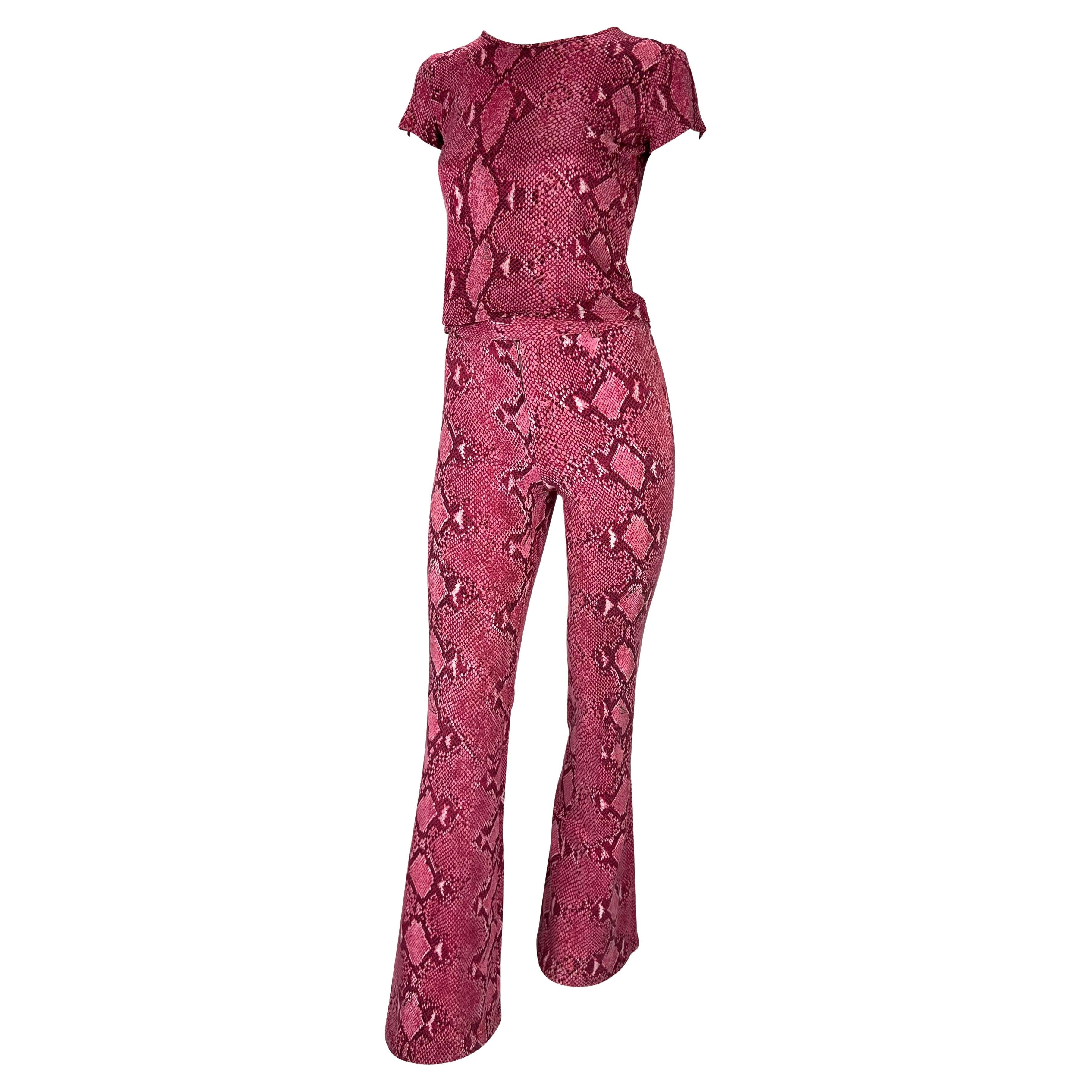 TheRealList presents: a fabulous pink snake print Gucci pant set, designed by Tom Ford. From the Spring/Summer 2000 collection, the season's runway was covered in the identical snakeskin print as this set. This set consists of fitted flare pants and